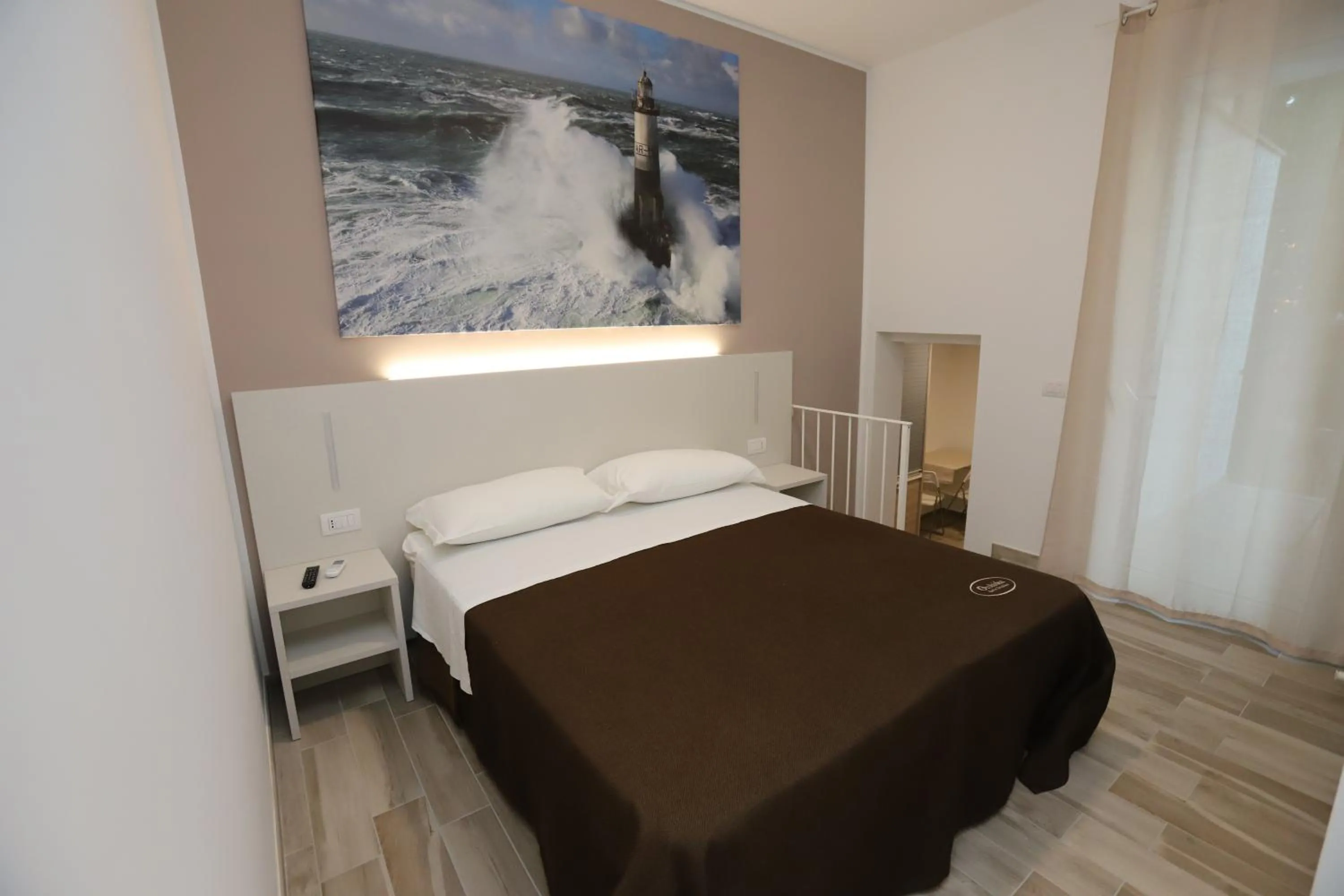 Photo of the whole room, Bed in Orchidea Rooms & Suites