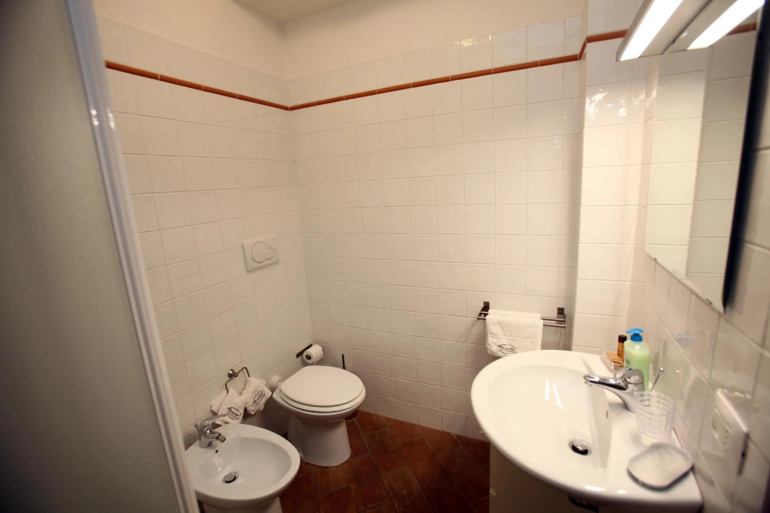 Bathroom in Orchidea Rooms & Suites