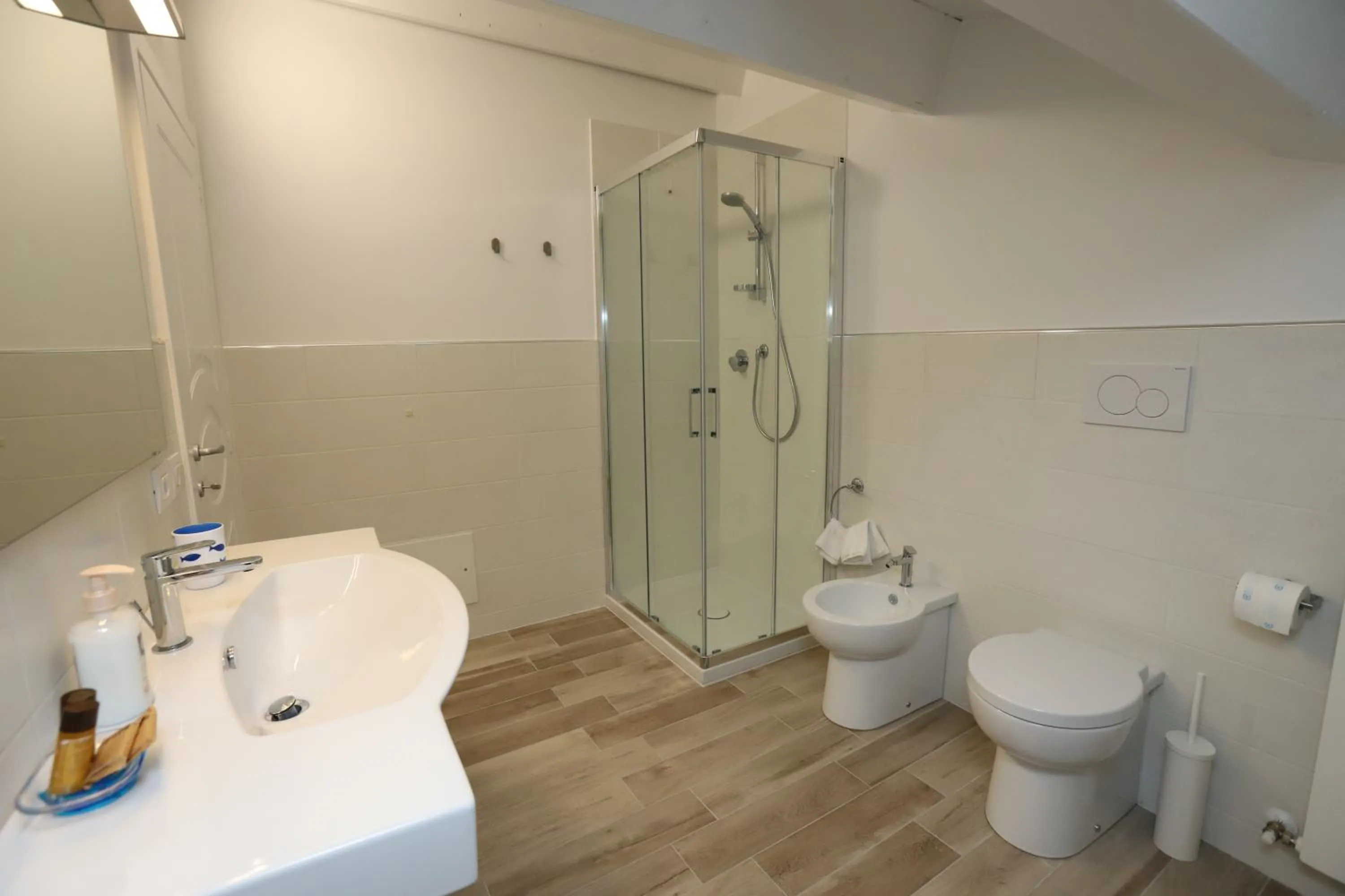 Bathroom in Orchidea Rooms & Suites