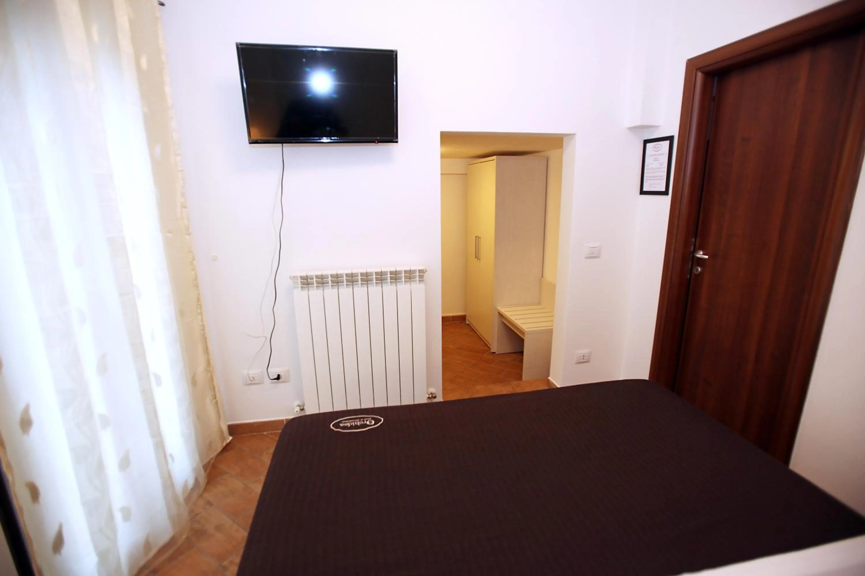Photo of the whole room, Bed in Orchidea Rooms & Suites