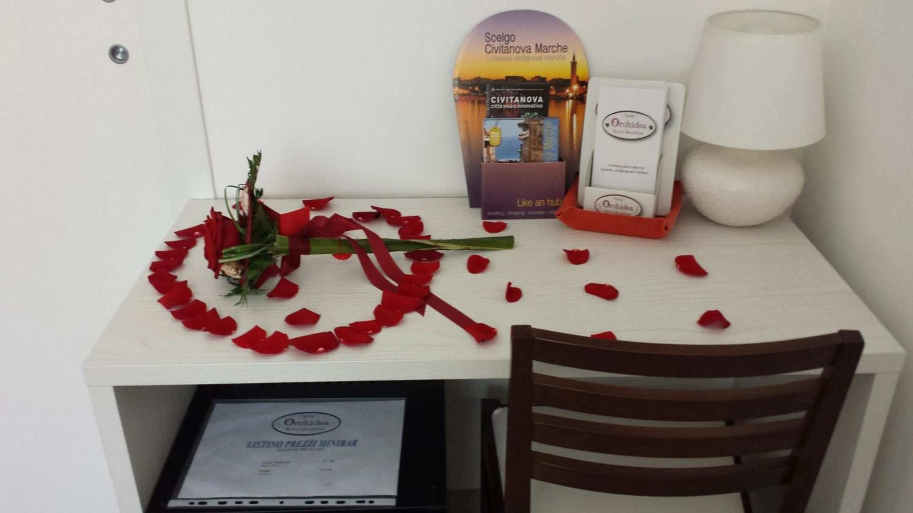 Bedroom in Orchidea Rooms & Suites