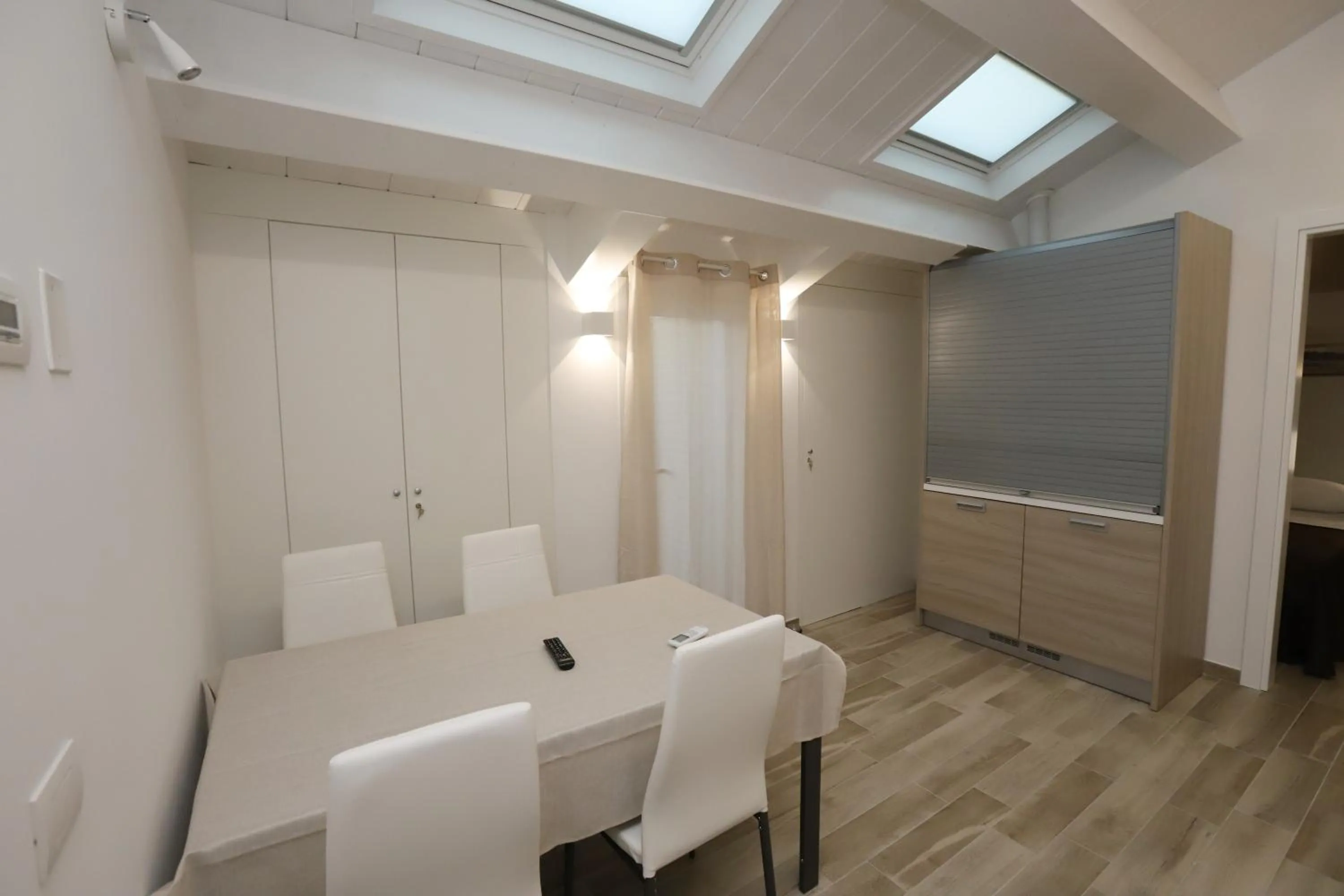 Seating area in Orchidea Rooms & Suites