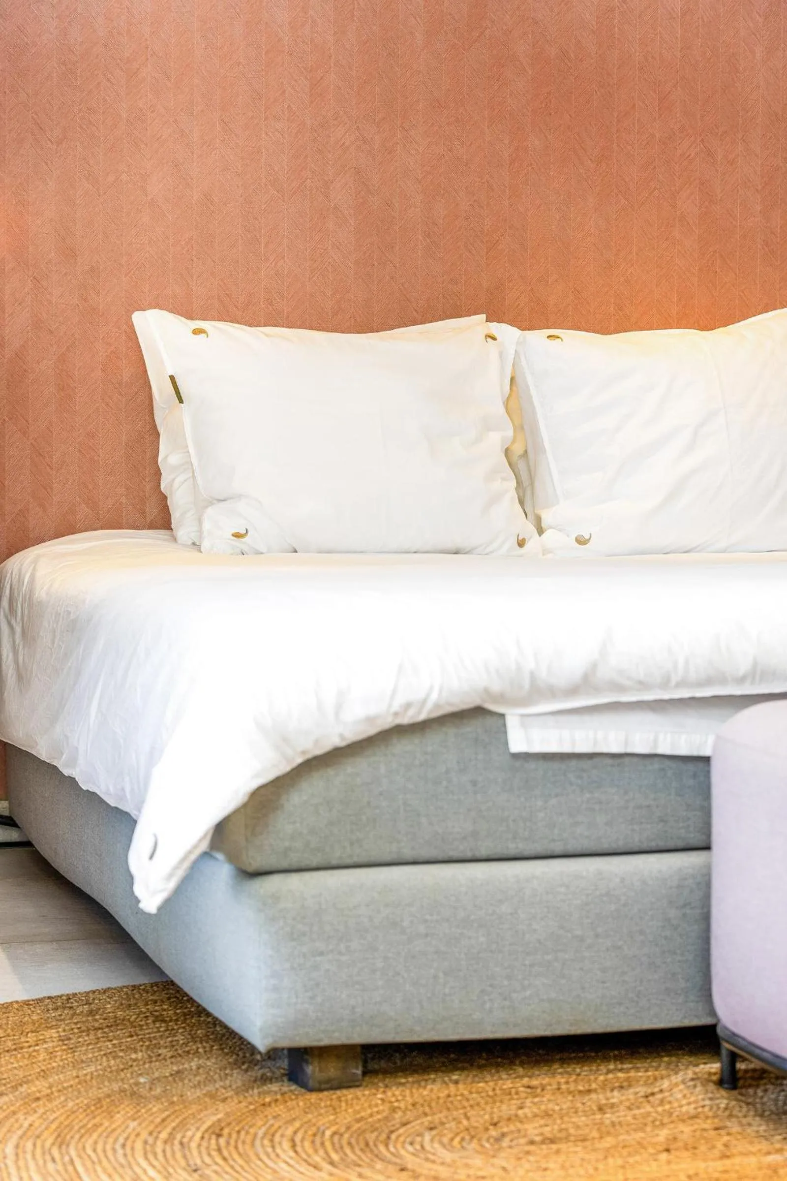 Bed in SENSES Boutique Hotel & Apartments