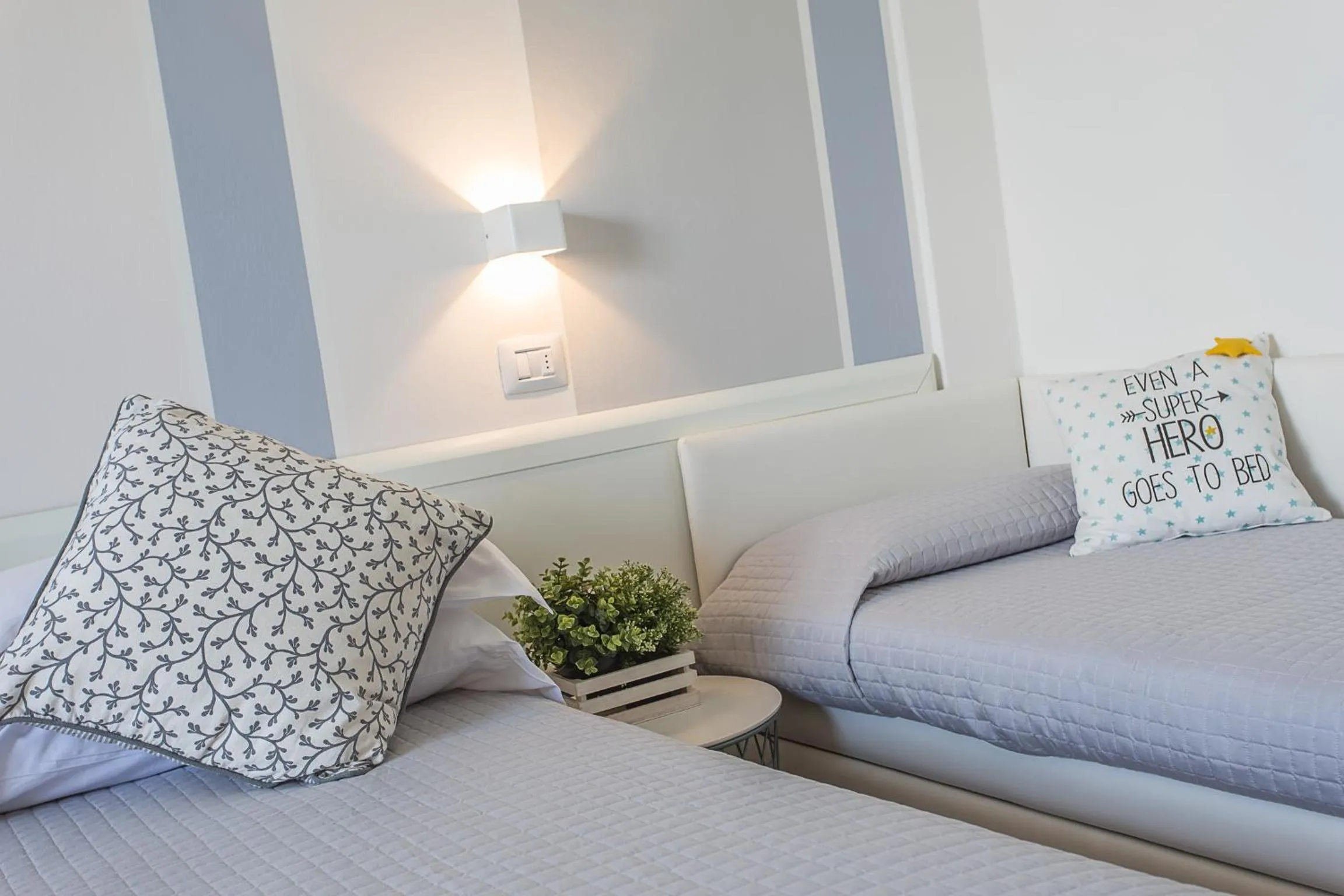 Bed in Hotel Geminus B&B