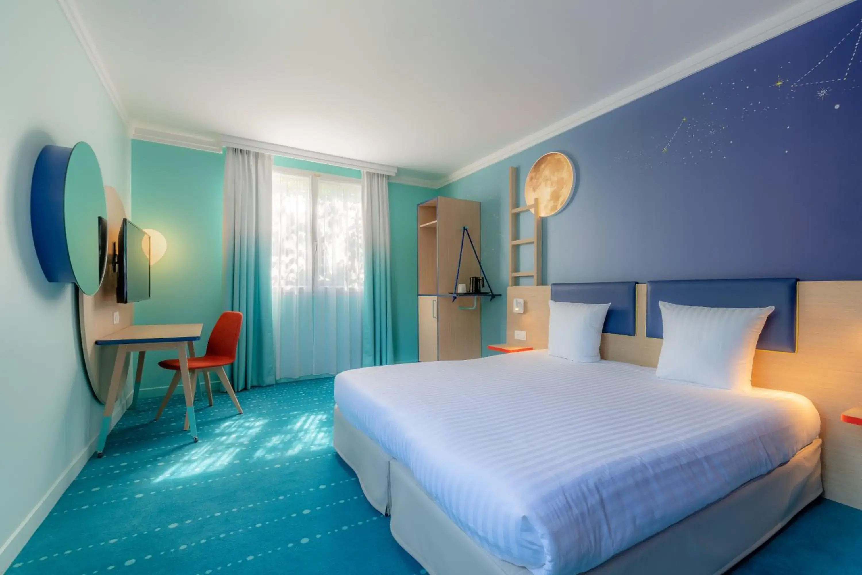 Photo of the whole room, Bed in Grand Magic Hotel Marne La Vallée Photo of the whole room, Bed in Grand Magic Hotel Marne La Vallée