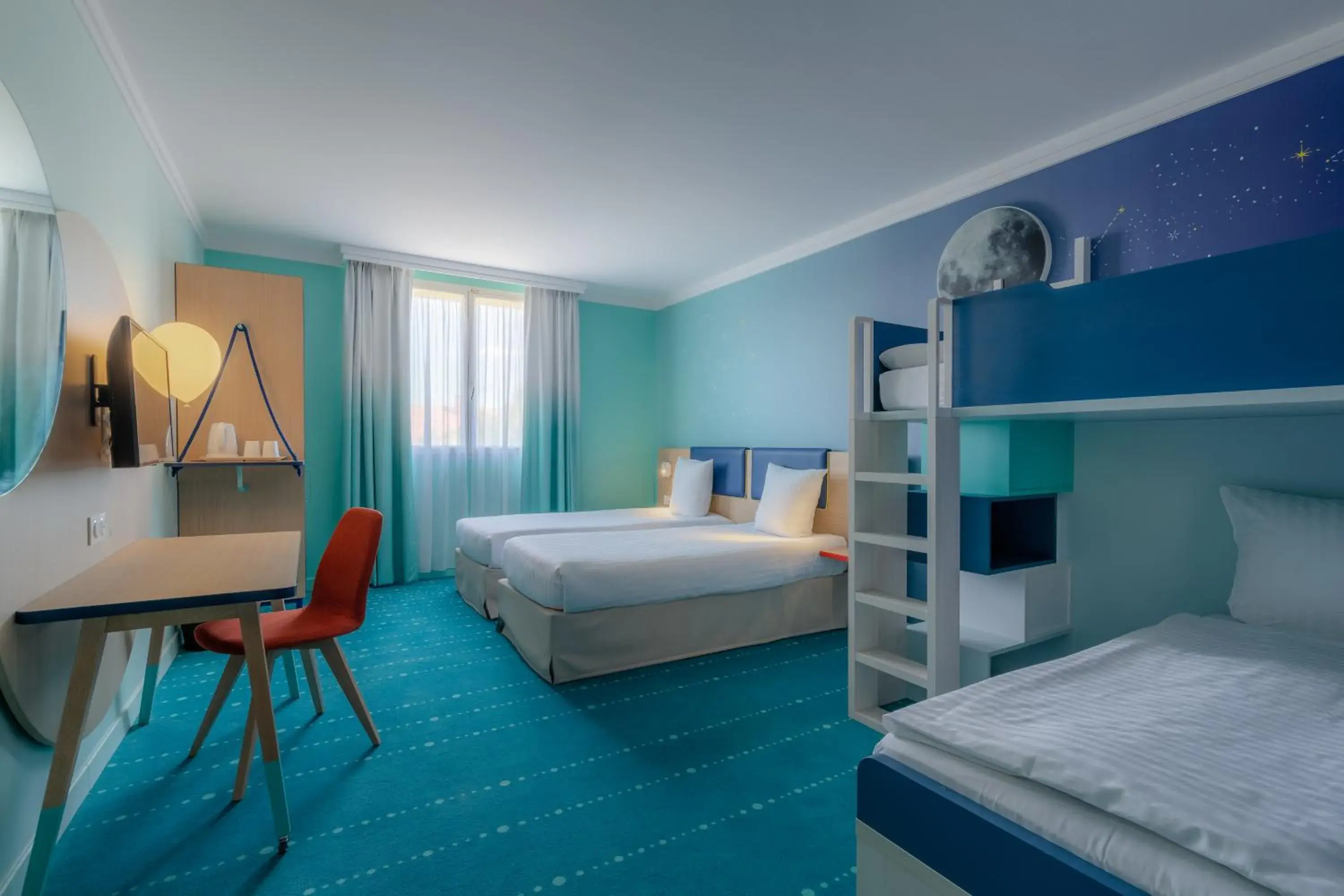 Photo of the whole room, Bed in Grand Magic Hotel Marne La Vallée Photo of the whole room, Bed in Grand Magic Hotel Marne La Vallée