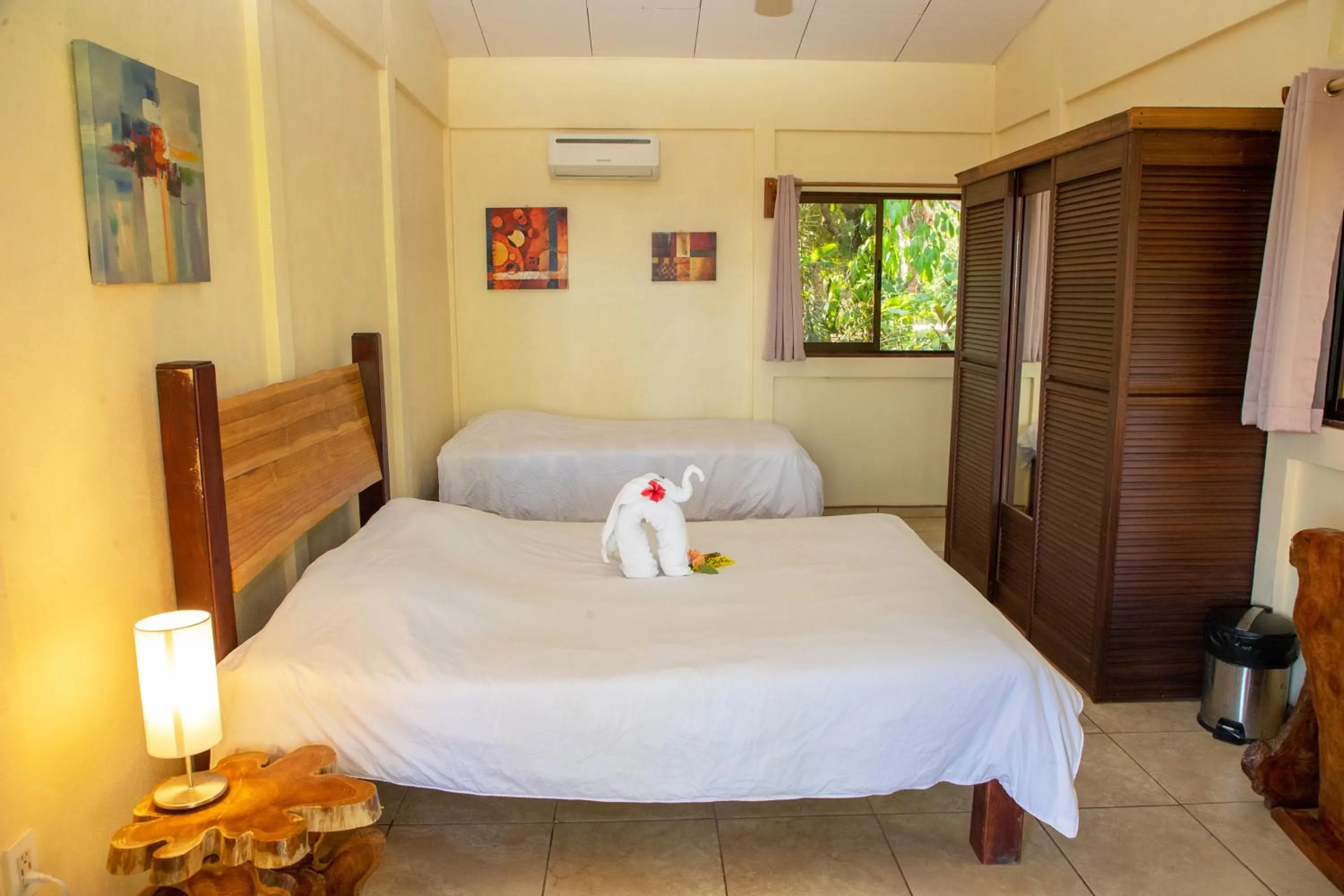 Bedroom, Bed in Jungle Lodge at Wild Sun Rescue Center