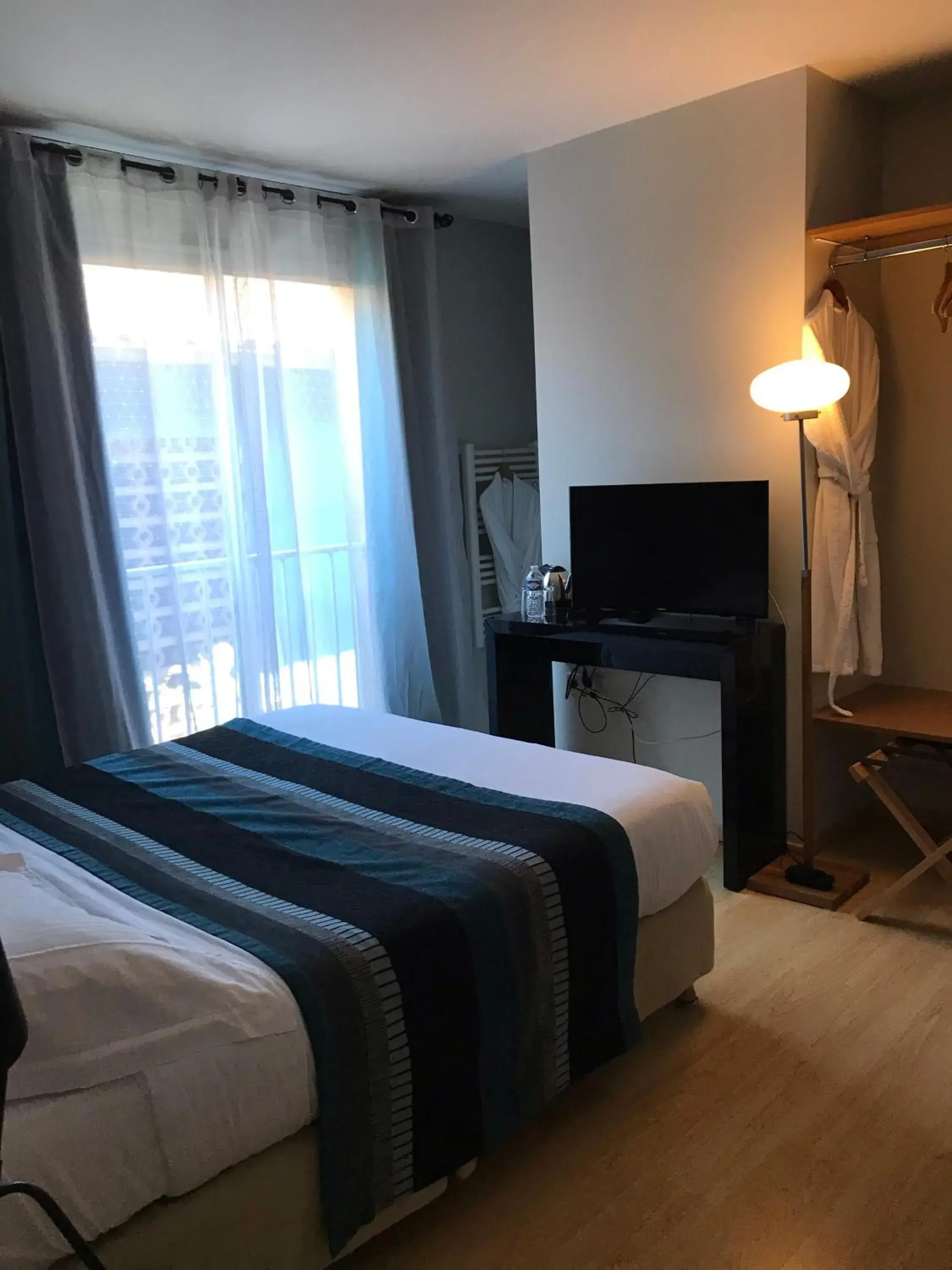 Photo of the whole room, Bed in Logis Au Canard Gourmand Photo of the whole room, Bed in Logis Au Canard Gourmand