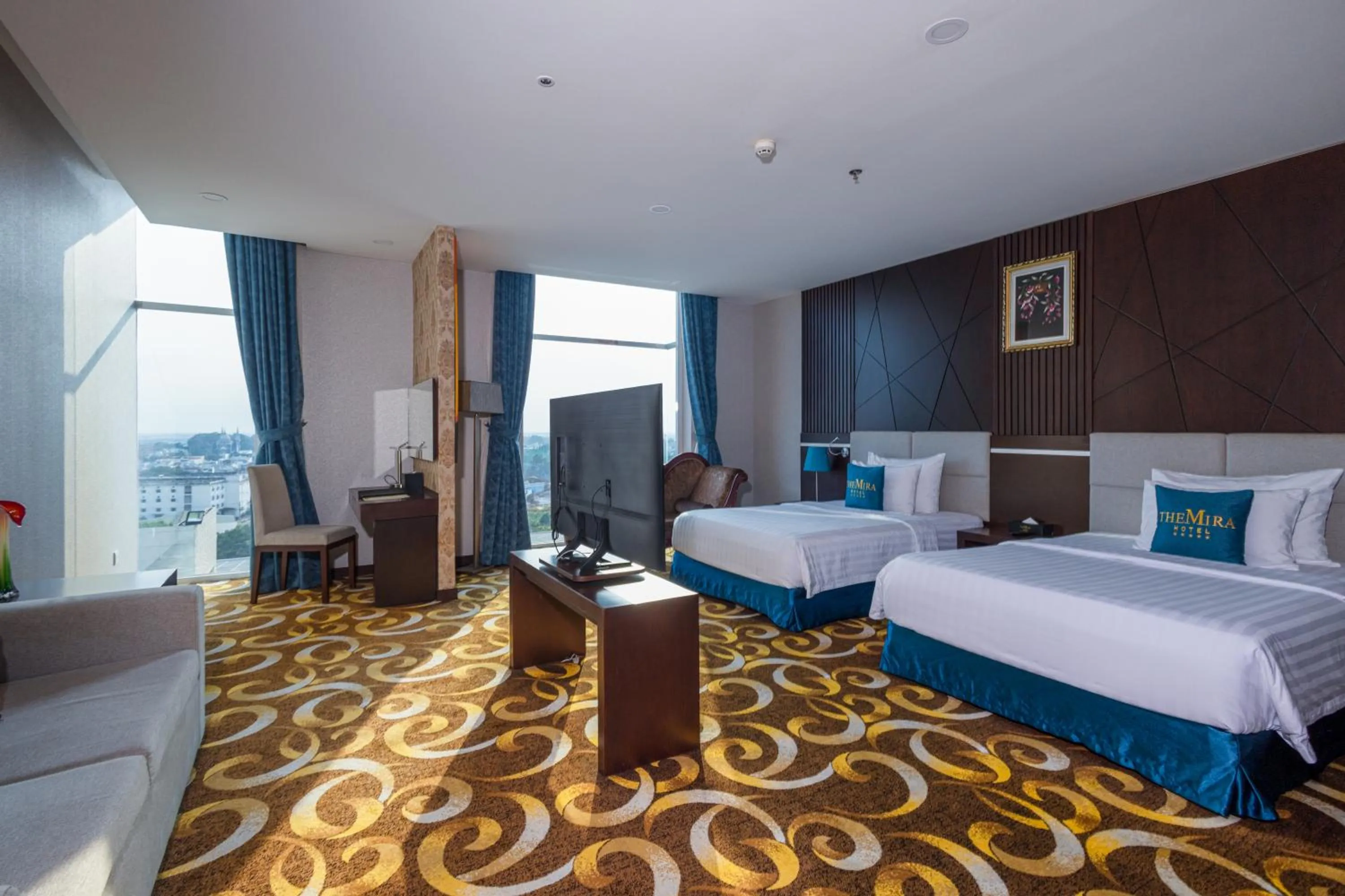 Bed in The Mira Hotel