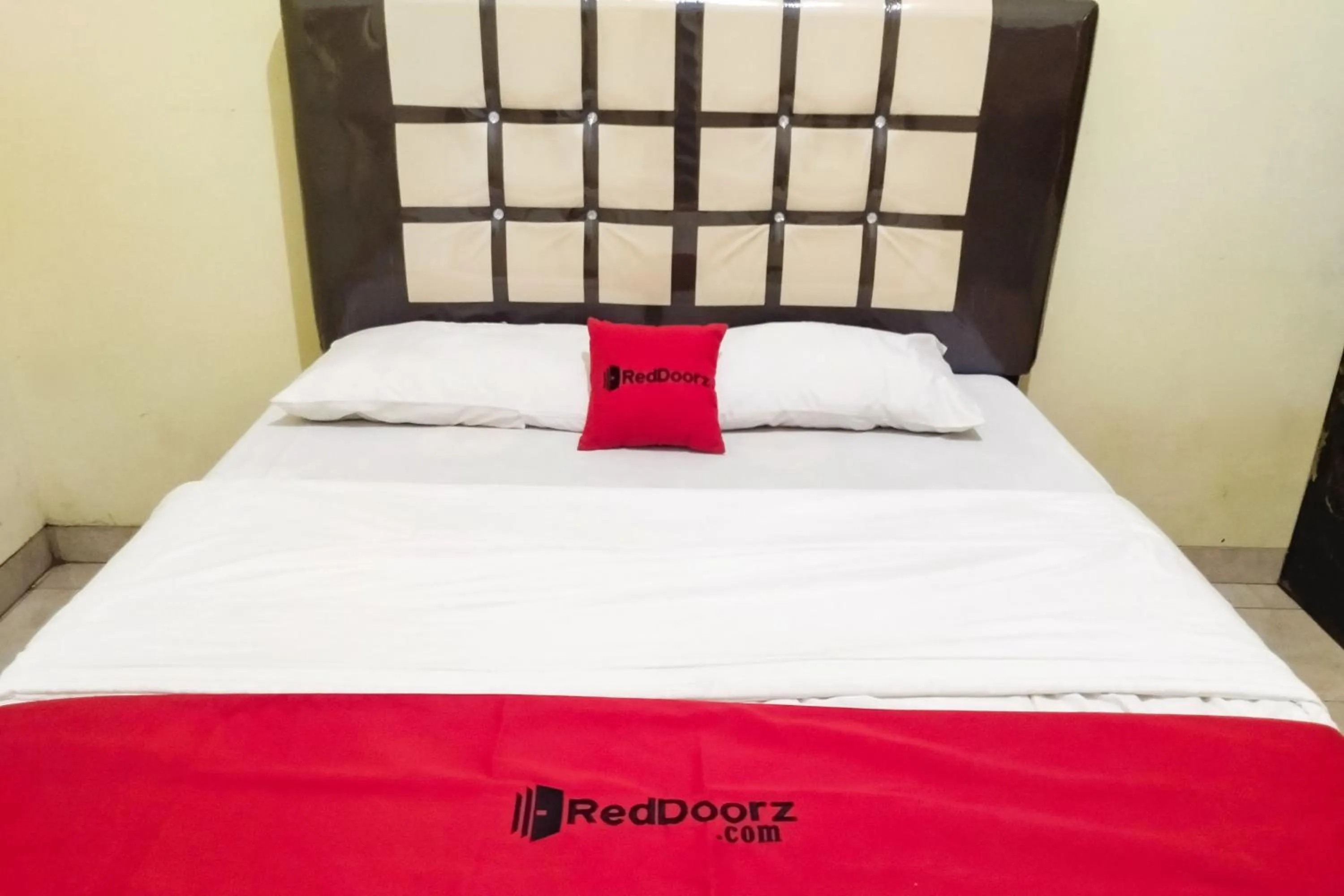 Bed in RedDoorz at Guesthouse Oemah Opa Metro Lampung