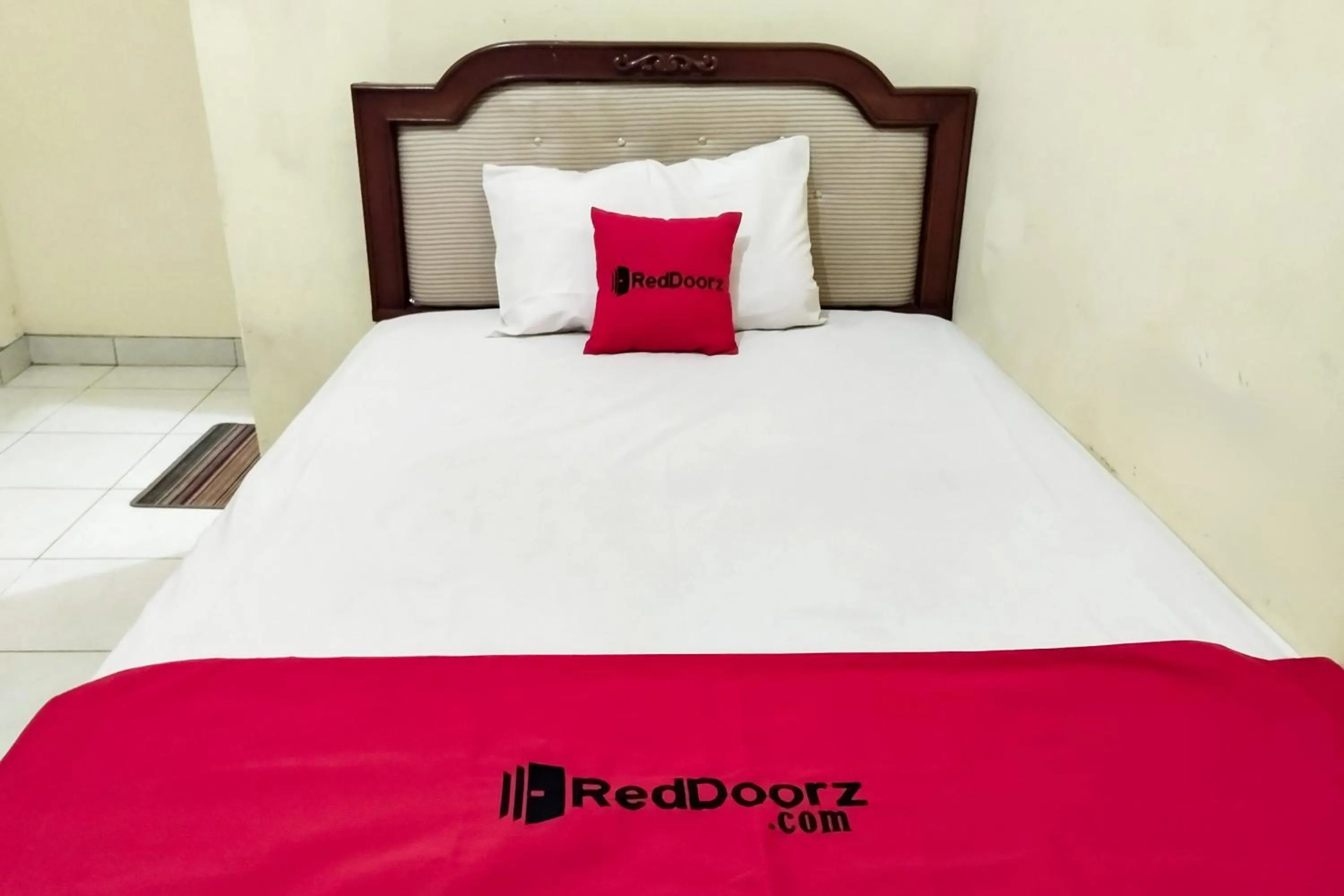 Bed in RedDoorz at Guesthouse Oemah Opa Metro Lampung