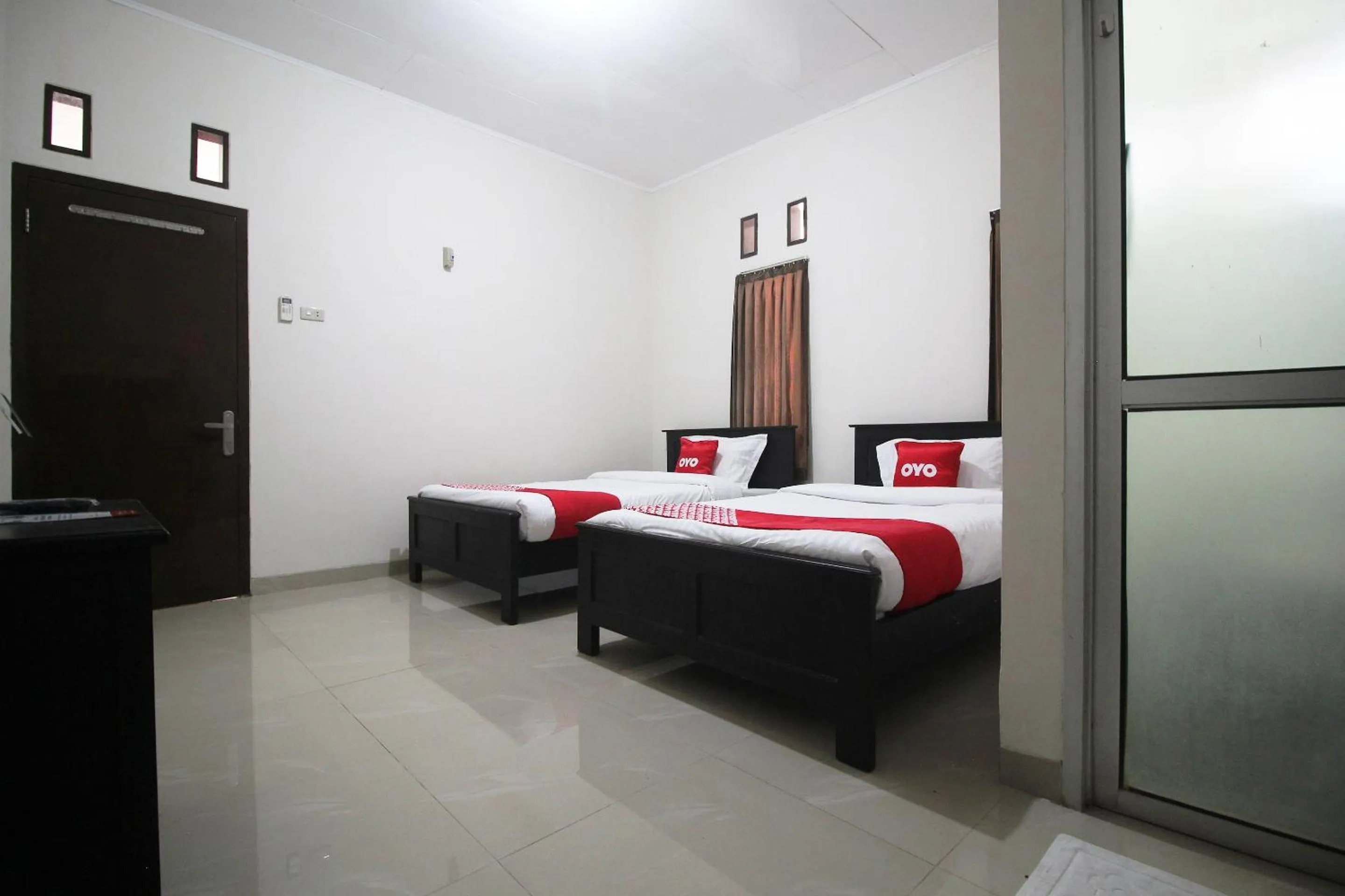 Bedroom, Bed in Hotel O Wisma Ray Syariah