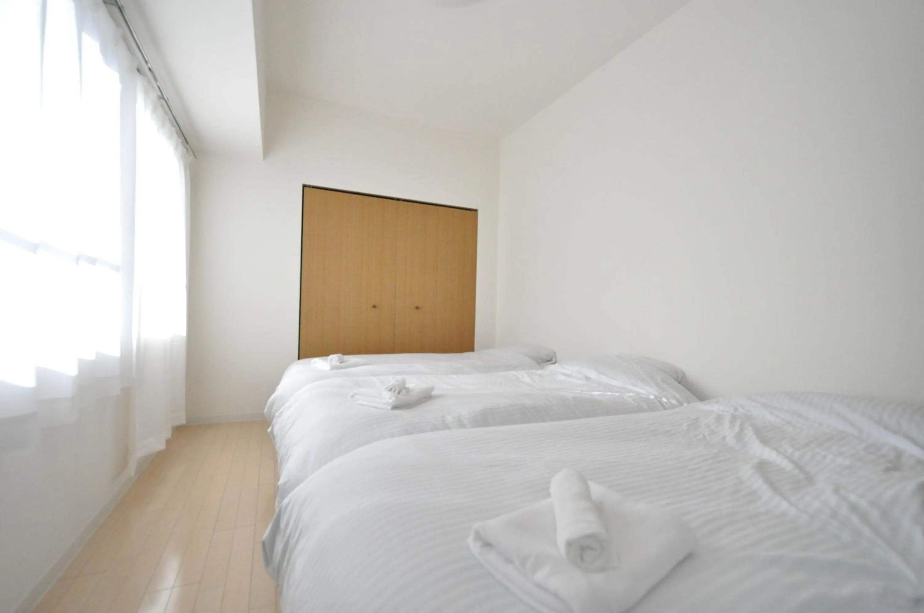 Bed in IK Minami6Jo Residence 301