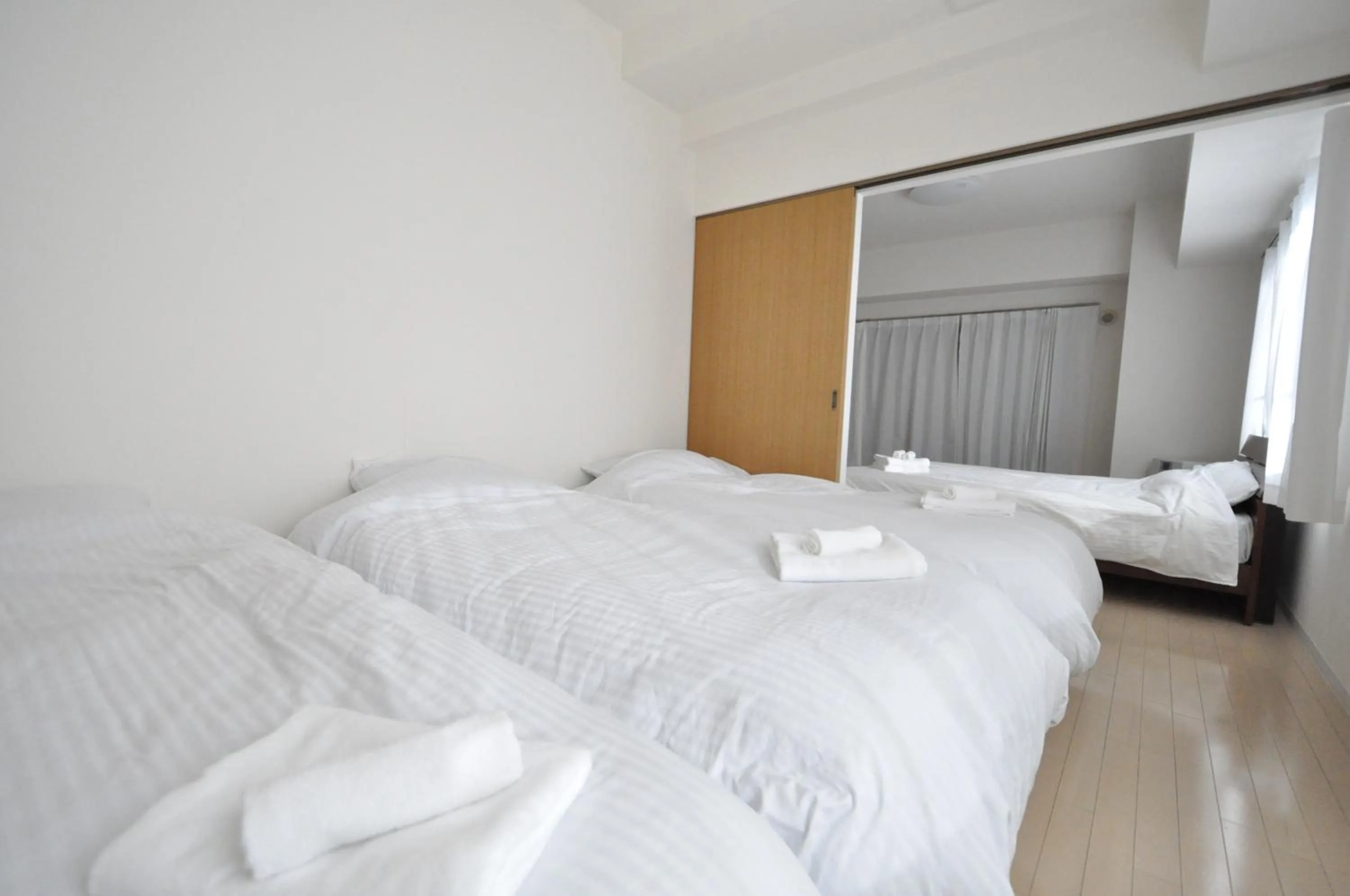 Bed in IK Minami6Jo Residence 301