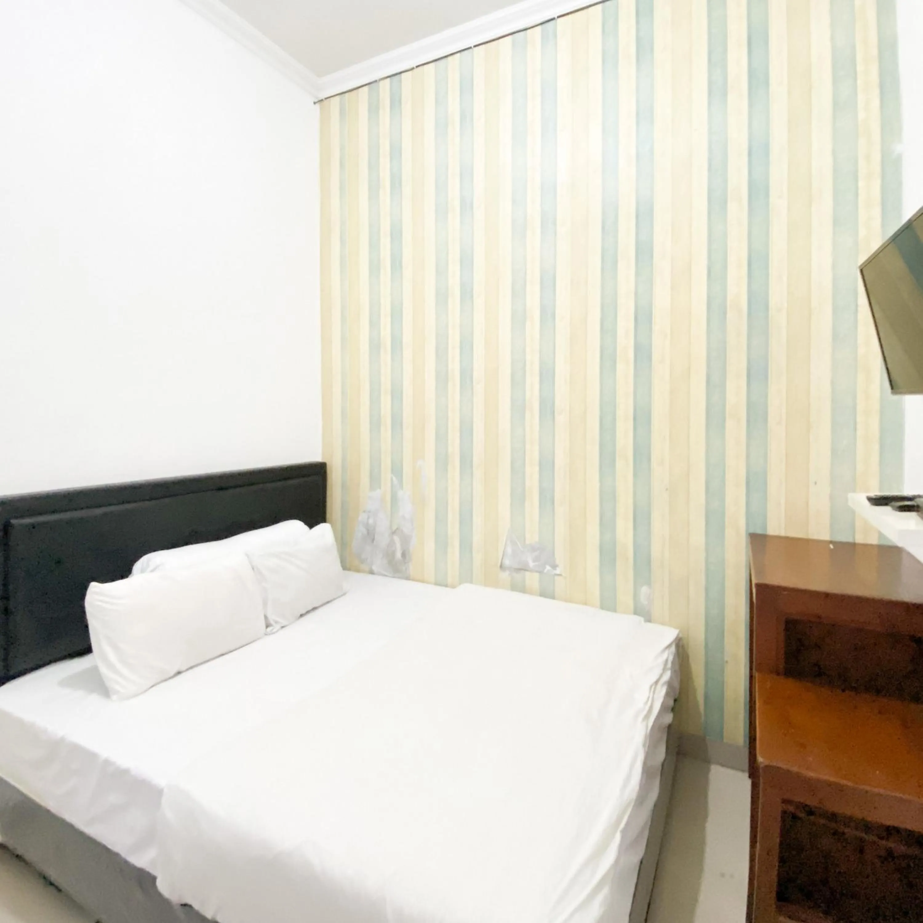 Bedroom in The Eco Village Homestay RedPartner