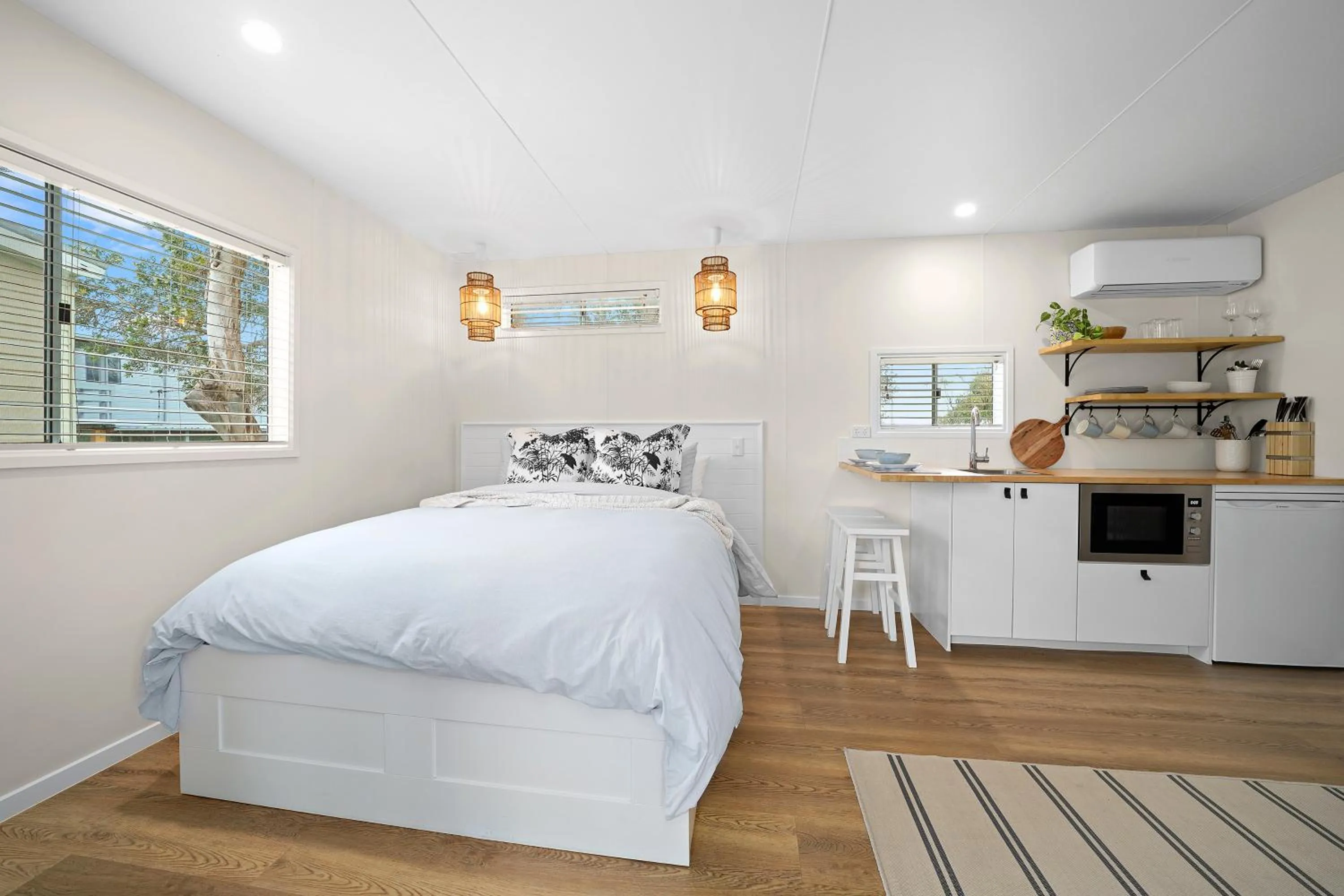 Bed in Little Palm Cabins