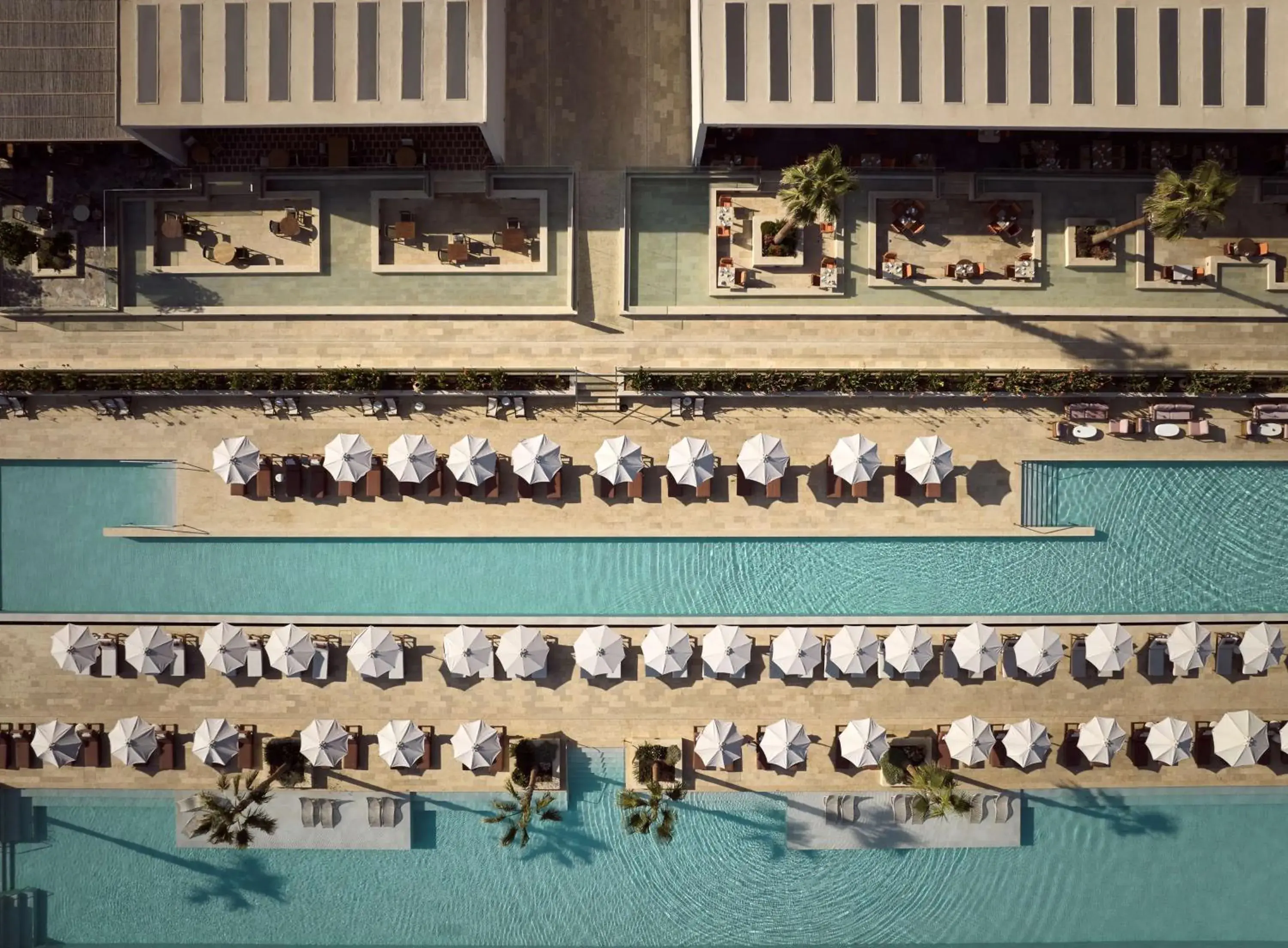 Pool view in The Royal Senses Resort & Spa Crete, Curio Collection by Hilton Pool view in The Royal Senses Resort & Spa Crete, Curio Collection by Hilton