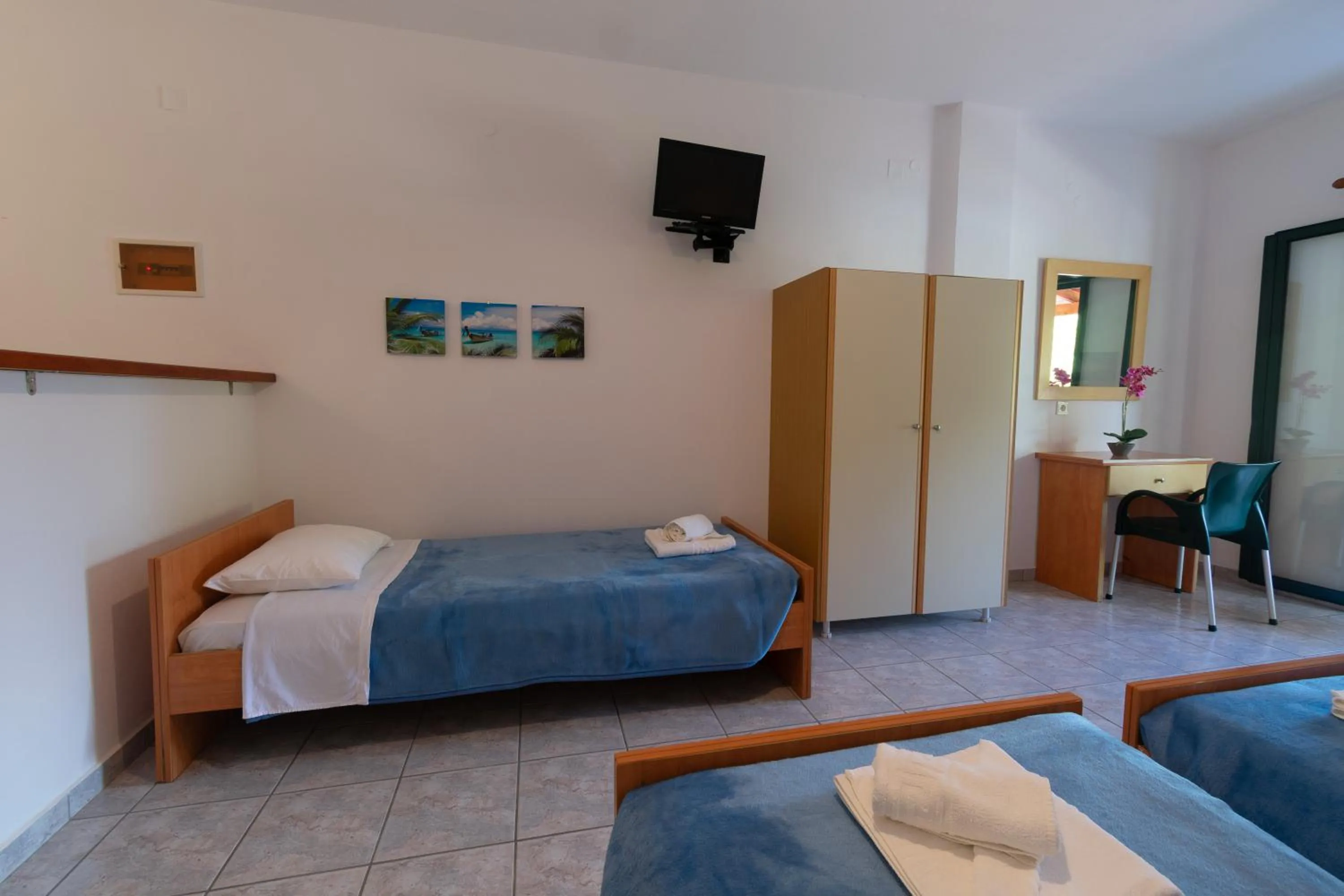 Photo of the whole room, Bed in Rivendell Apartments