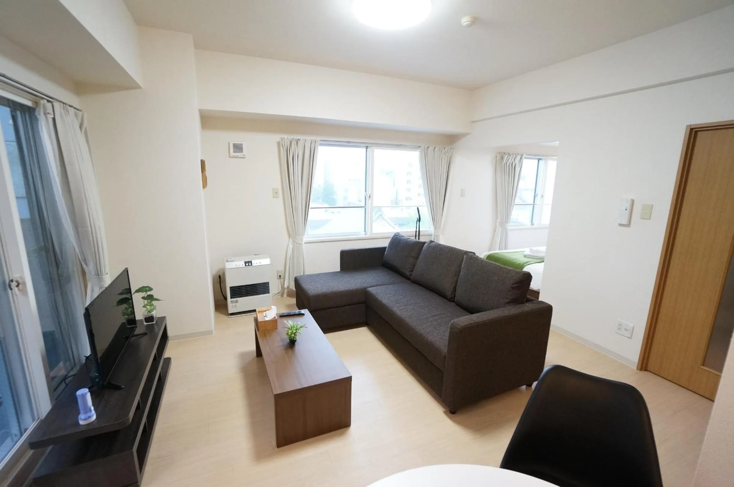 Living room in Downtown area Spacious cozy room Susukino IK901