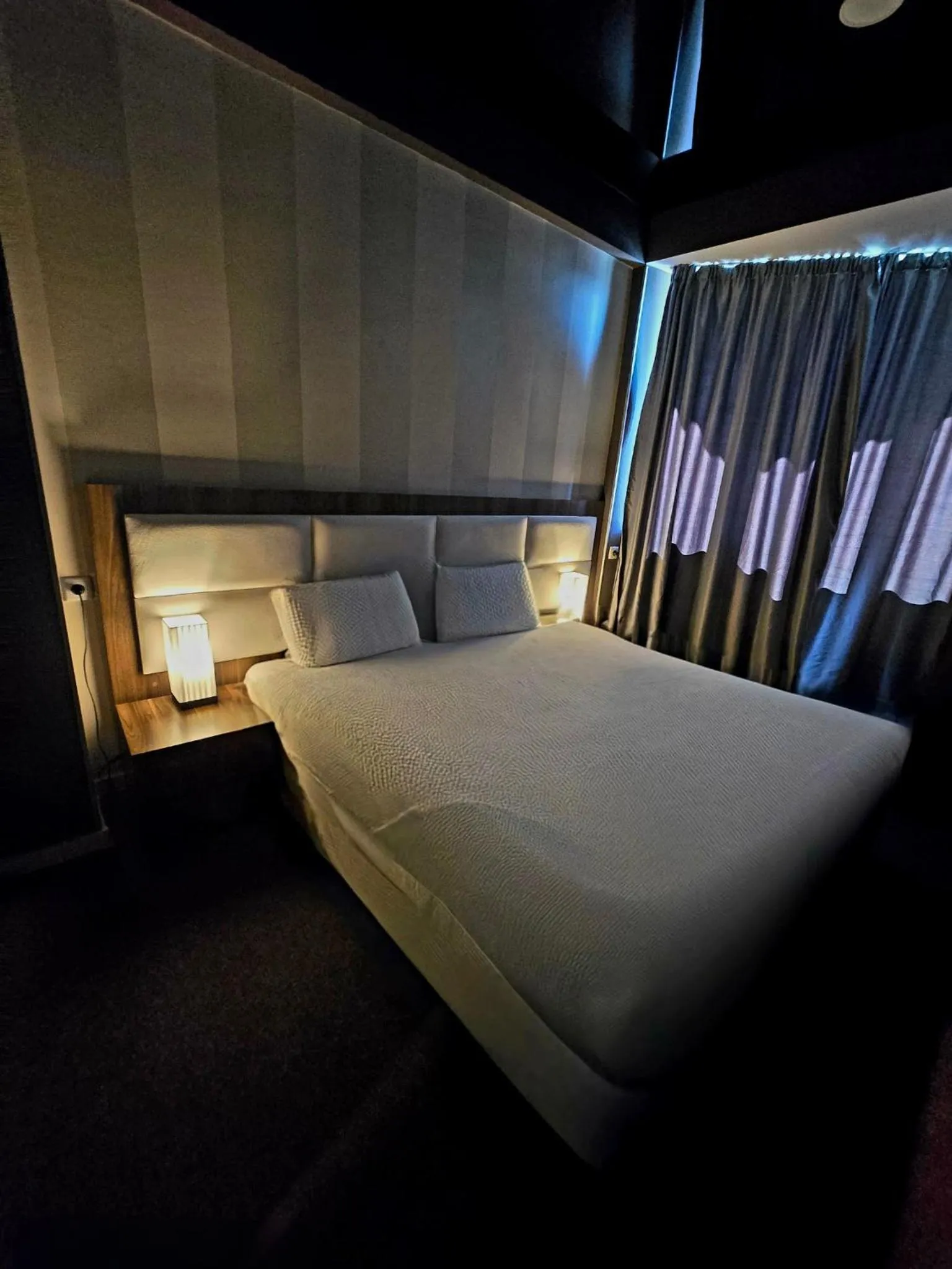 Bed in Apart Hotel West