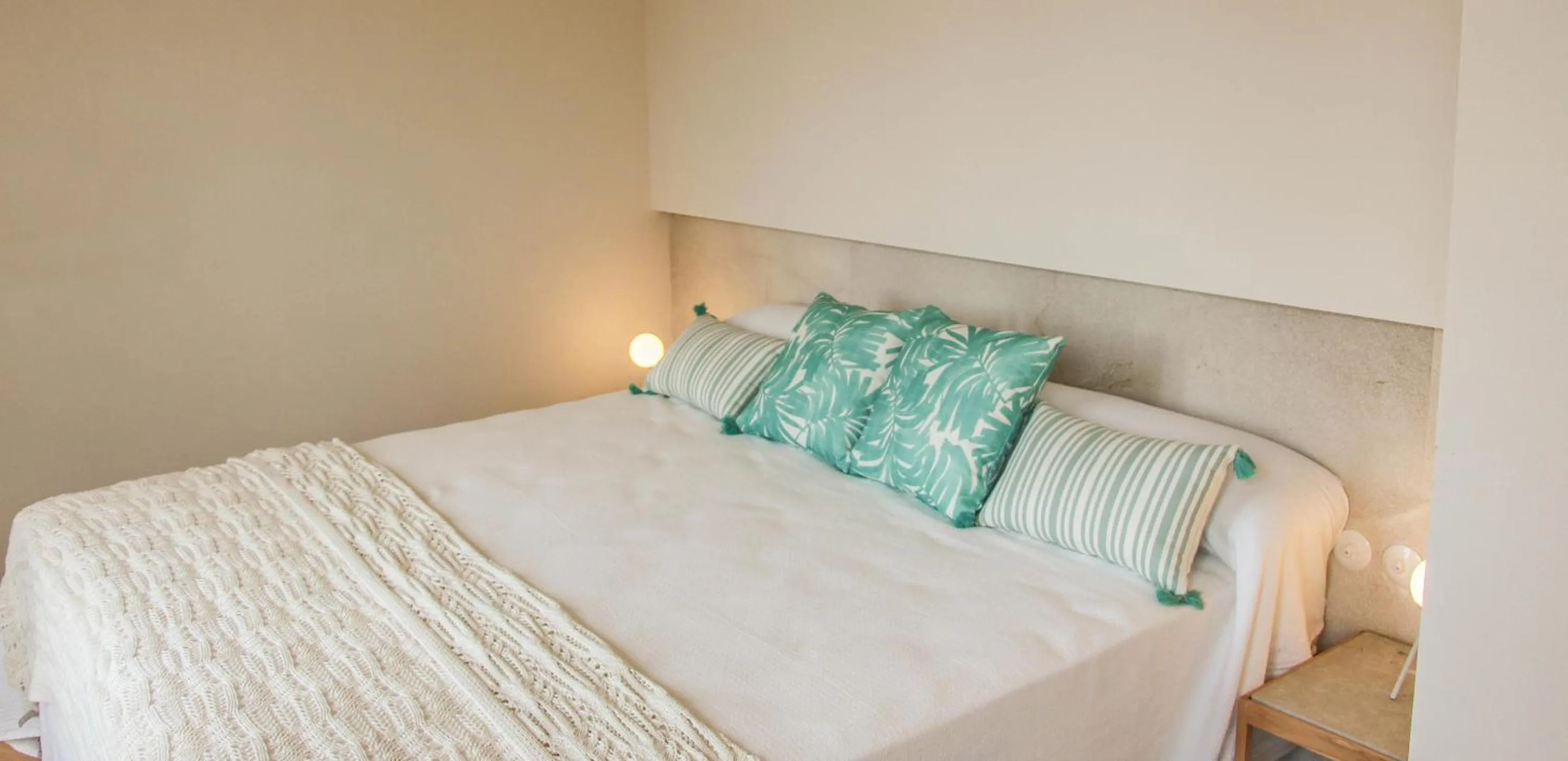 Bed in The Boc Suites