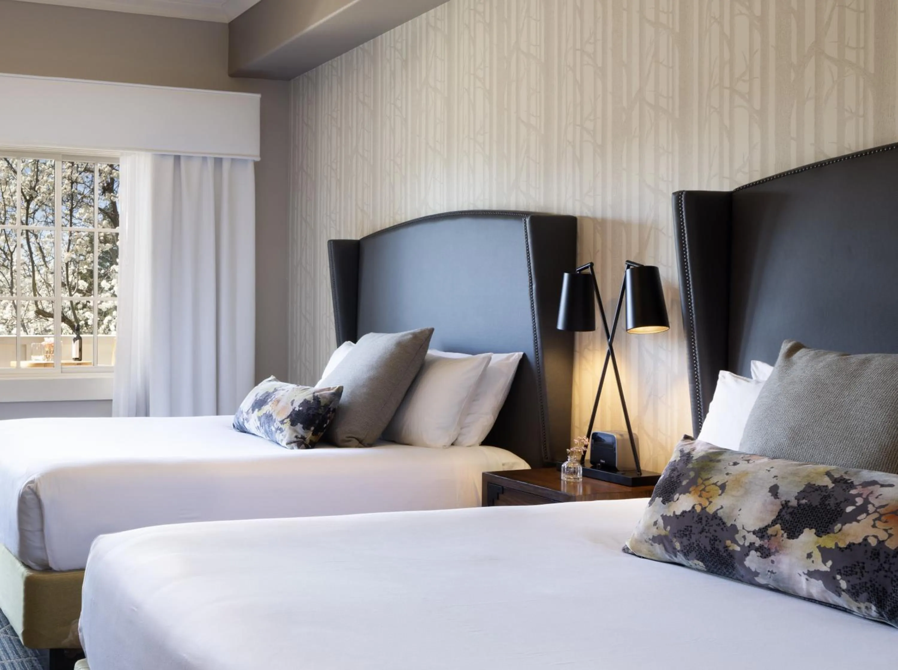 Bed in River Terrace Inn, a Noble House Hotel