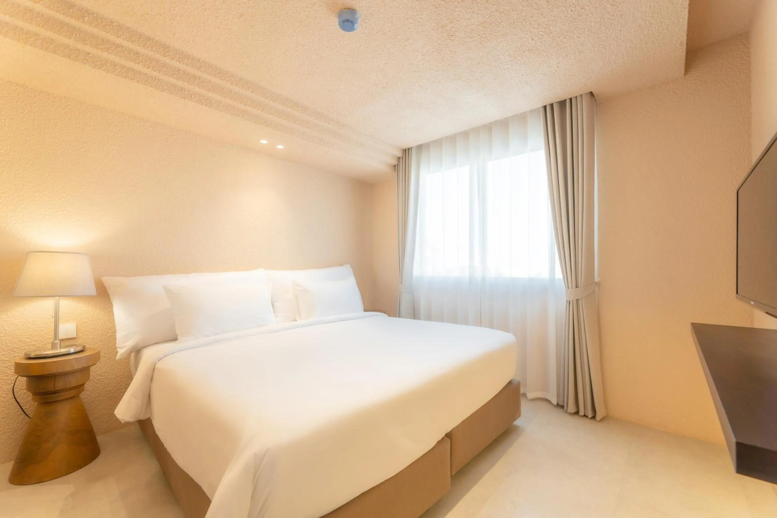 Bed in Mai Hotel Chiang Mai ใหม่โฮเทล เชียงใหม่