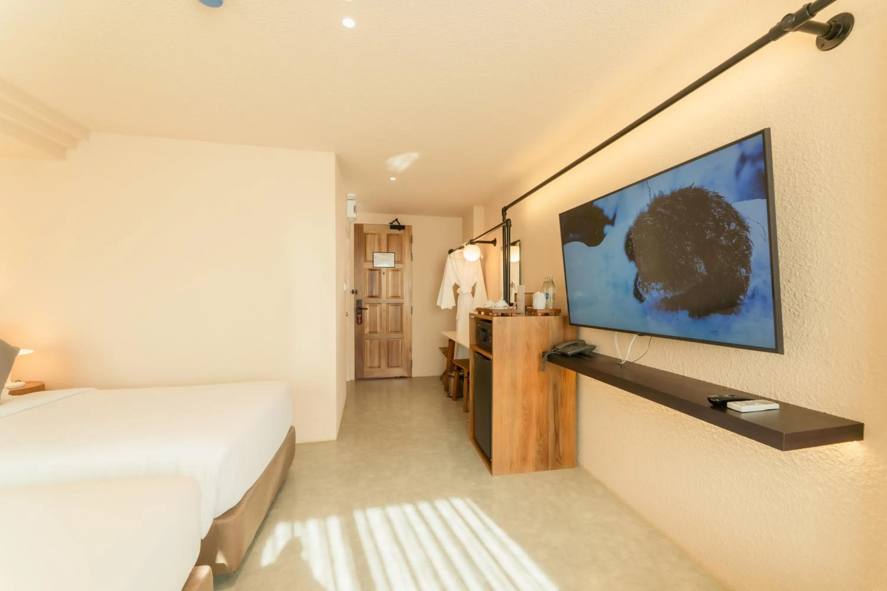 Bed in Mai Hotel Chiang Mai ใหม่โฮเทล เชียงใหม่