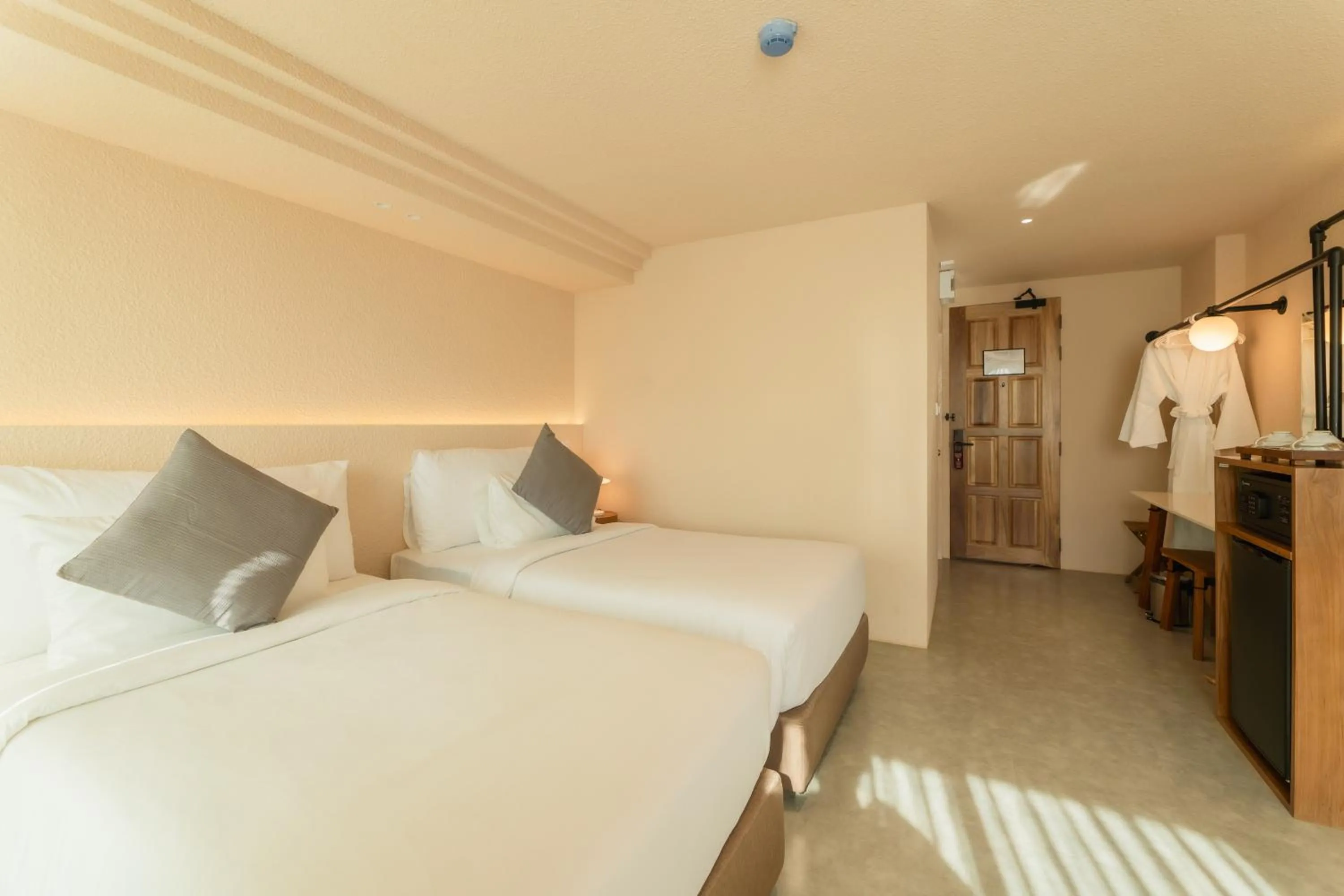 Bed in Mai Hotel Chiang Mai ใหม่โฮเทล เชียงใหม่