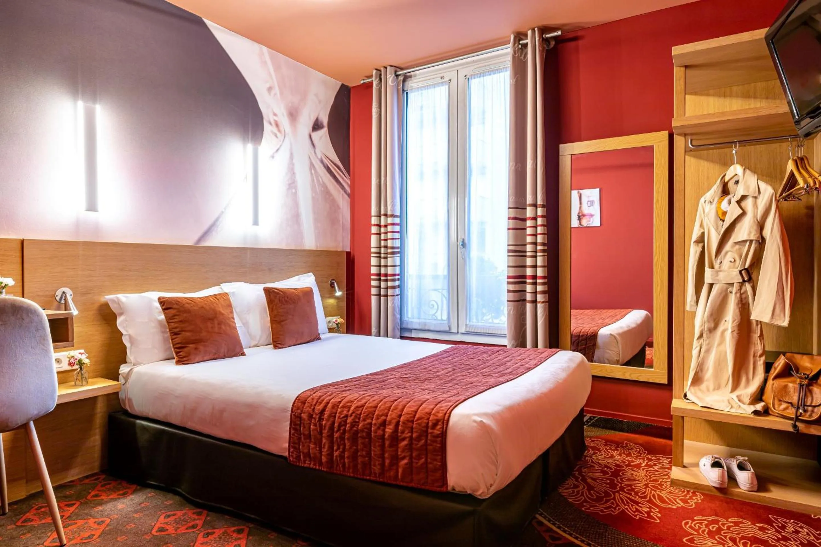 Bed in Hotel Ariane Montparnasse by Patrick Hayat