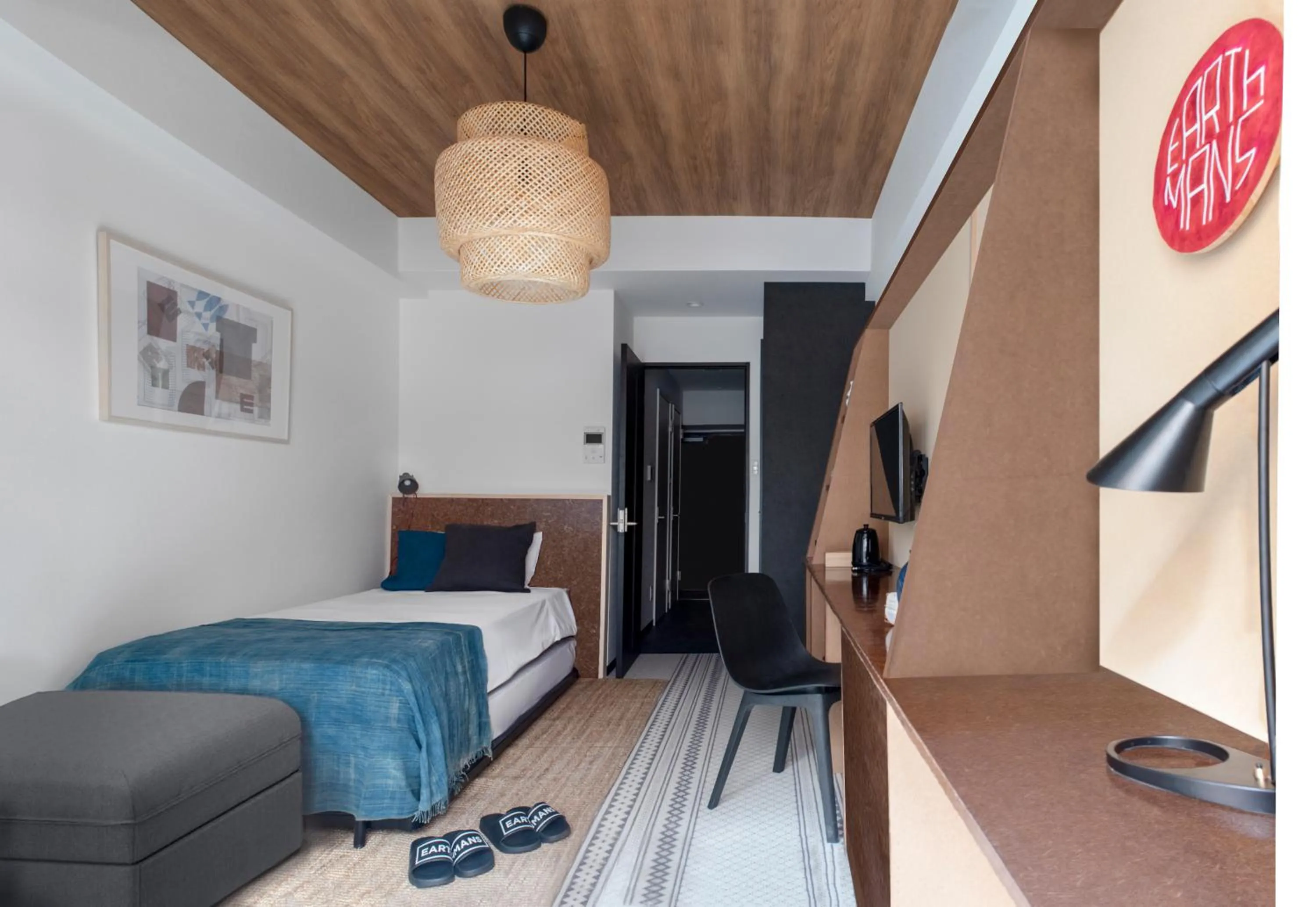 Photo of the whole room, Bed in EARTHMANS OSAKA-JO