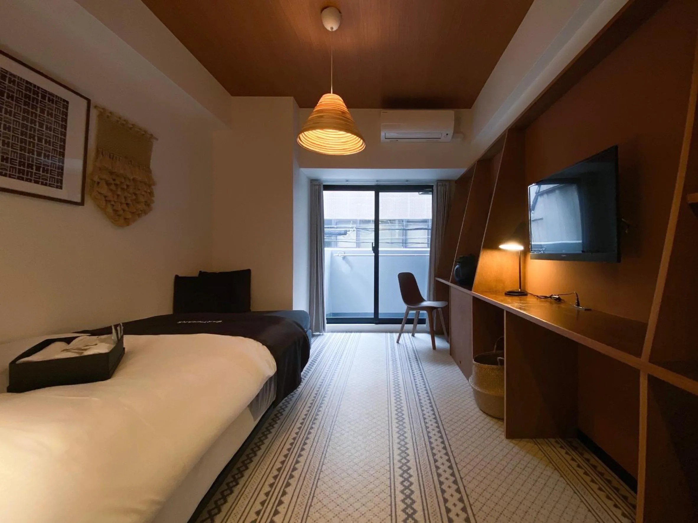 Bed in EARTHMANS OSAKA-JO