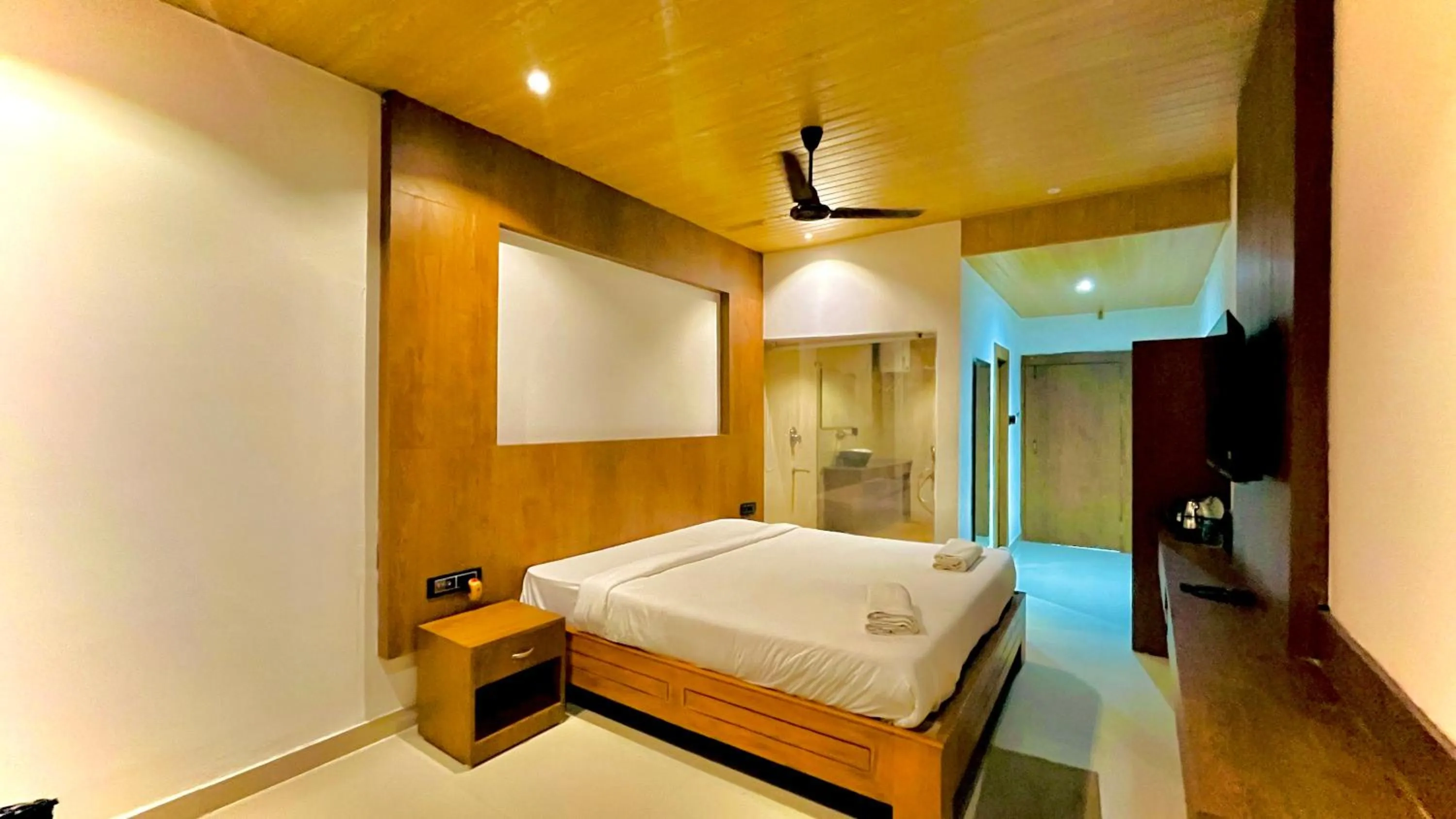 Bed in Kaziranga Eco Village Resort