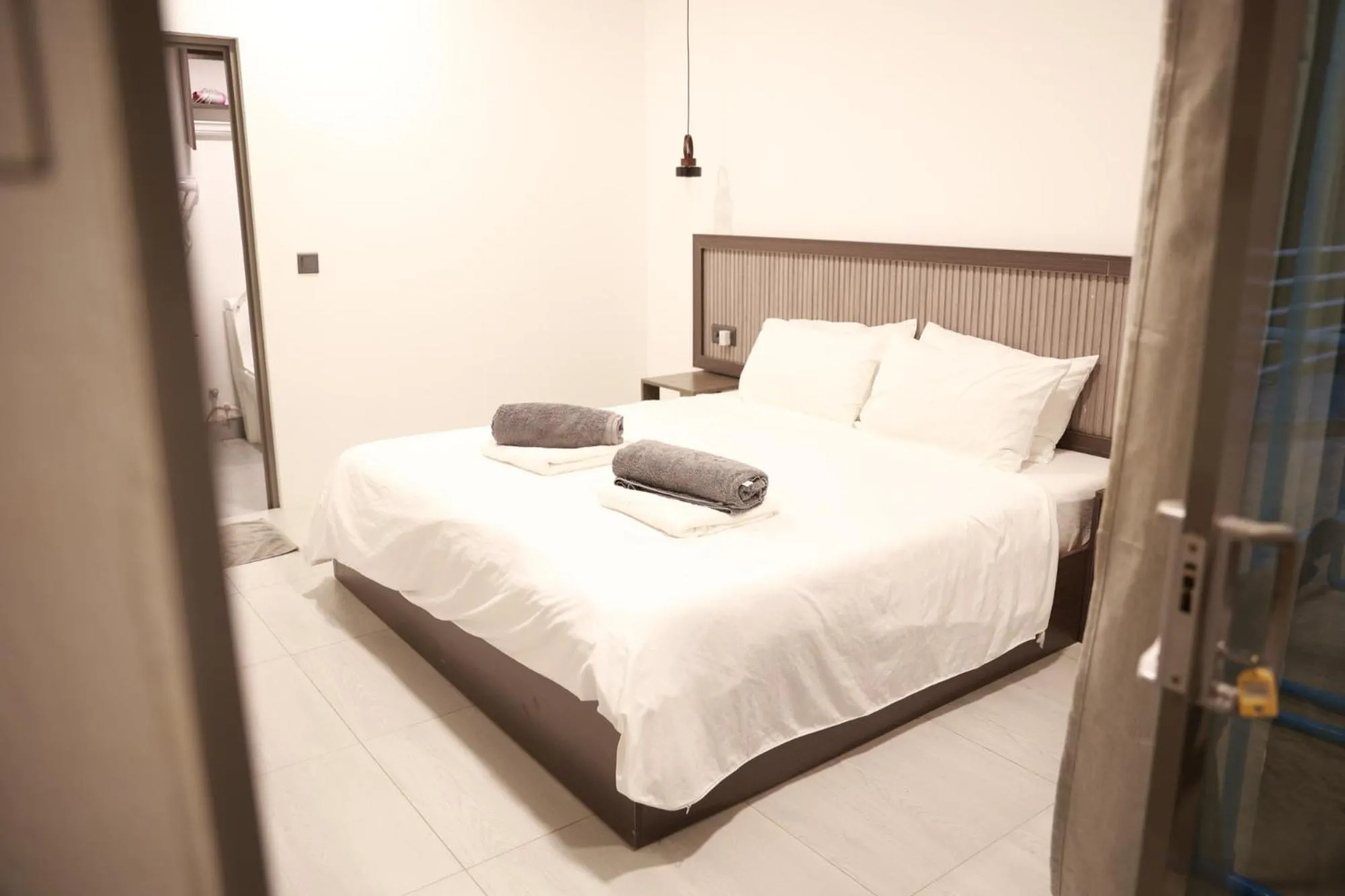 Bedroom, Bed in Nirili Villa