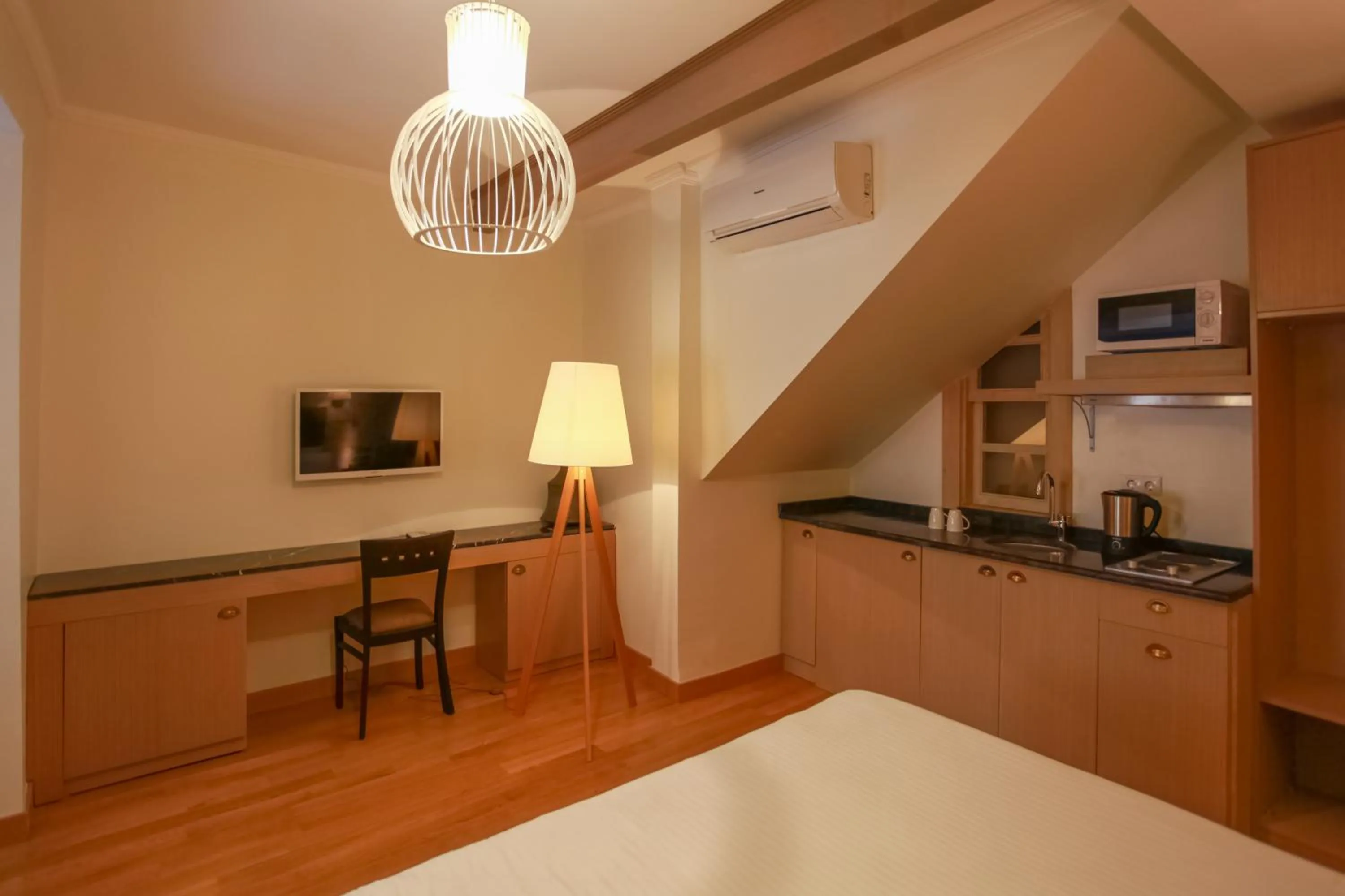 Kitchen or kitchenette in Alp Pasa Fiore Garden Suites - Special Class