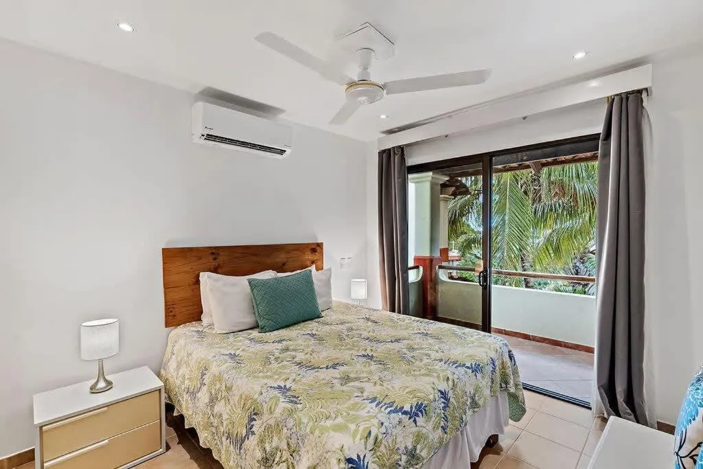Bed in Colorful & Private 2-Bedroom Condo Just a Short Walk from the Beach