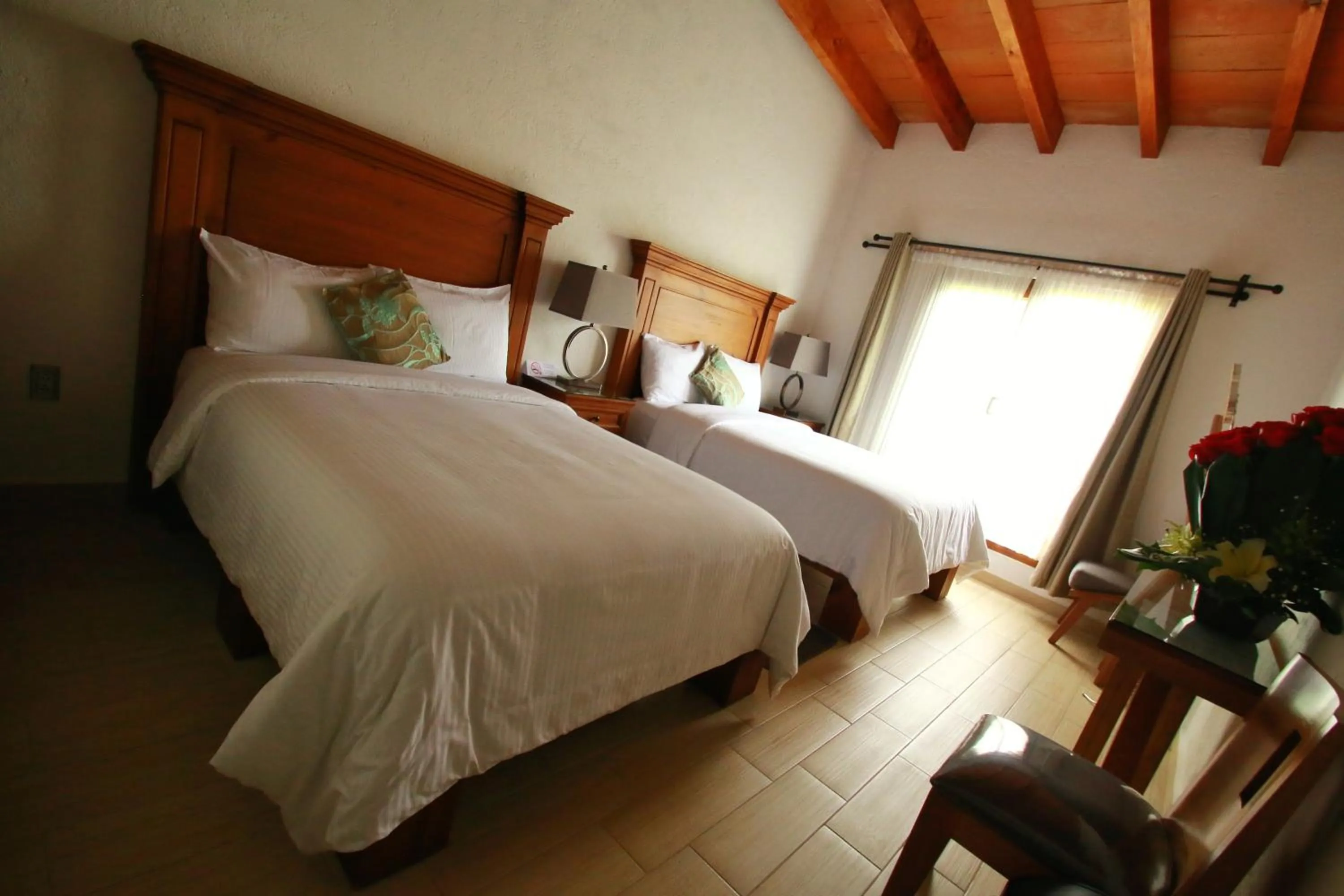 Bed in Hotel Concierge Flor y Canto