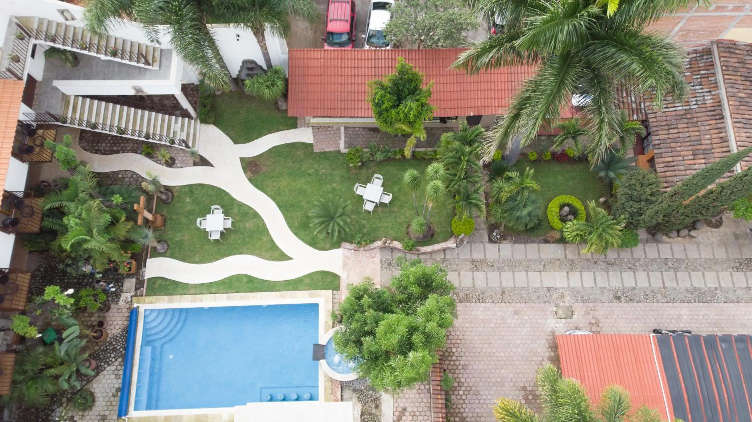 Property building in Hotel Concierge Flor y Canto