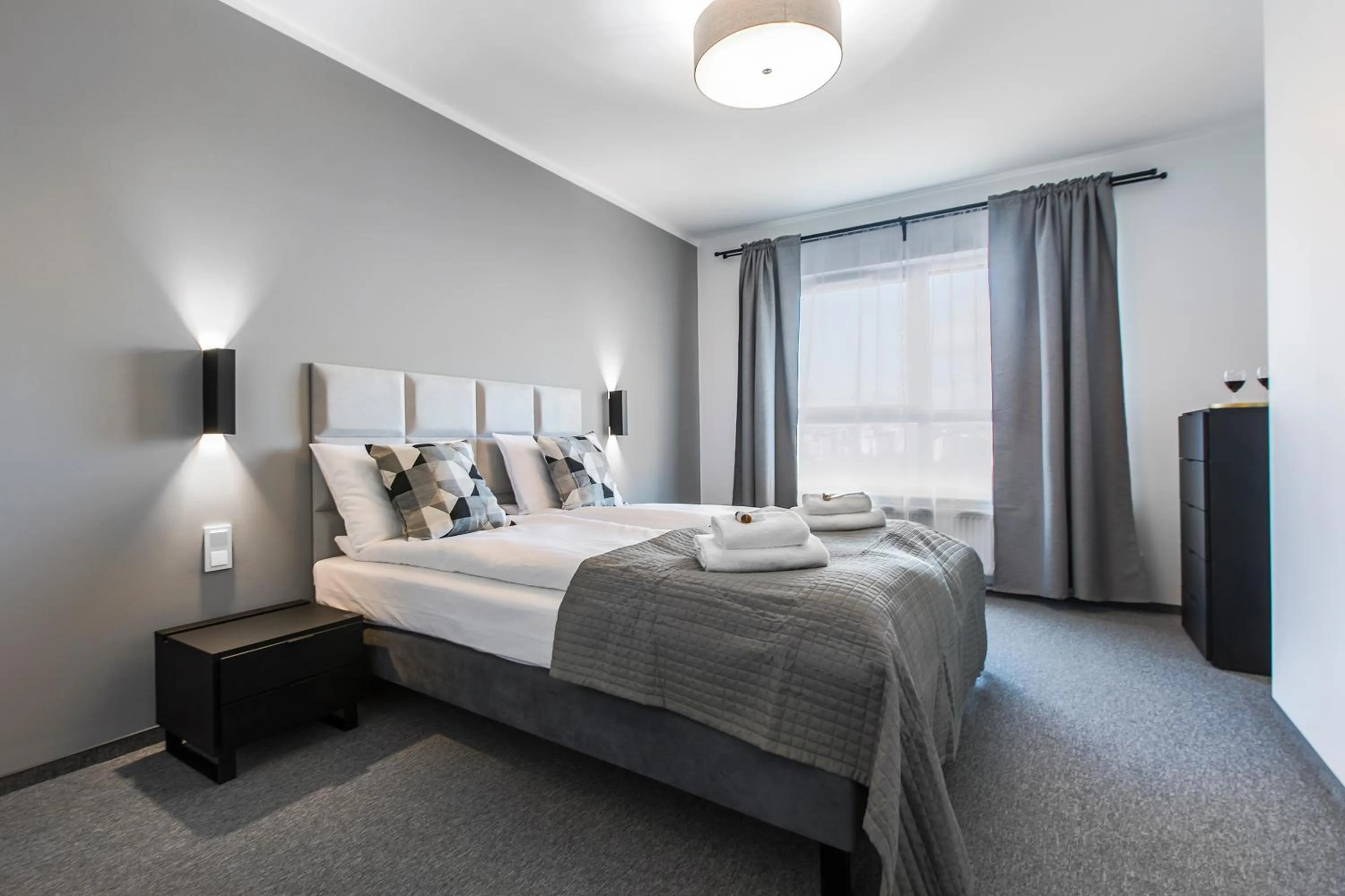 Bed in Symphony Baltica Towers Apartamenty