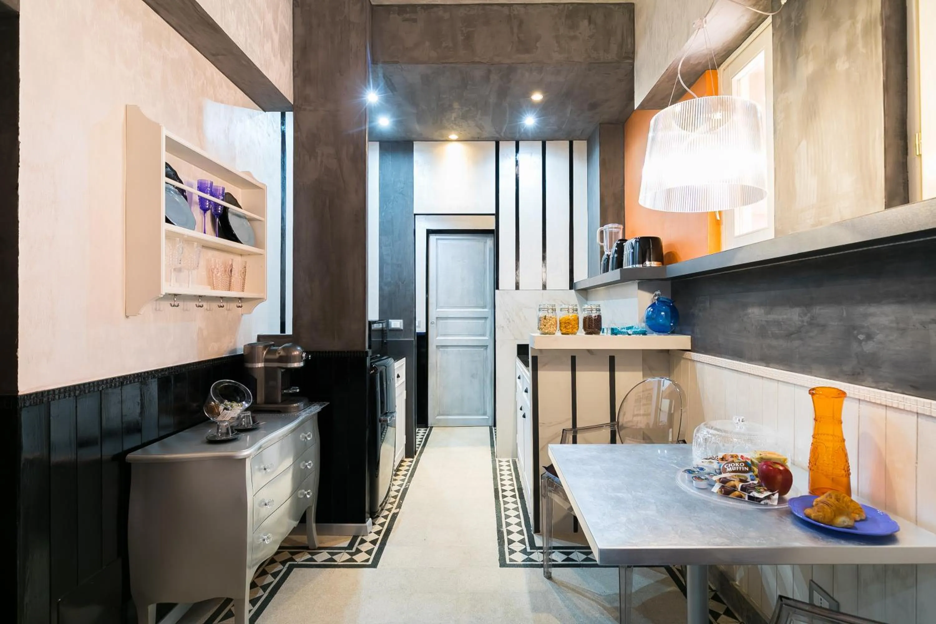 Kitchen or kitchenette in Appartamenti MarcoAurelio49