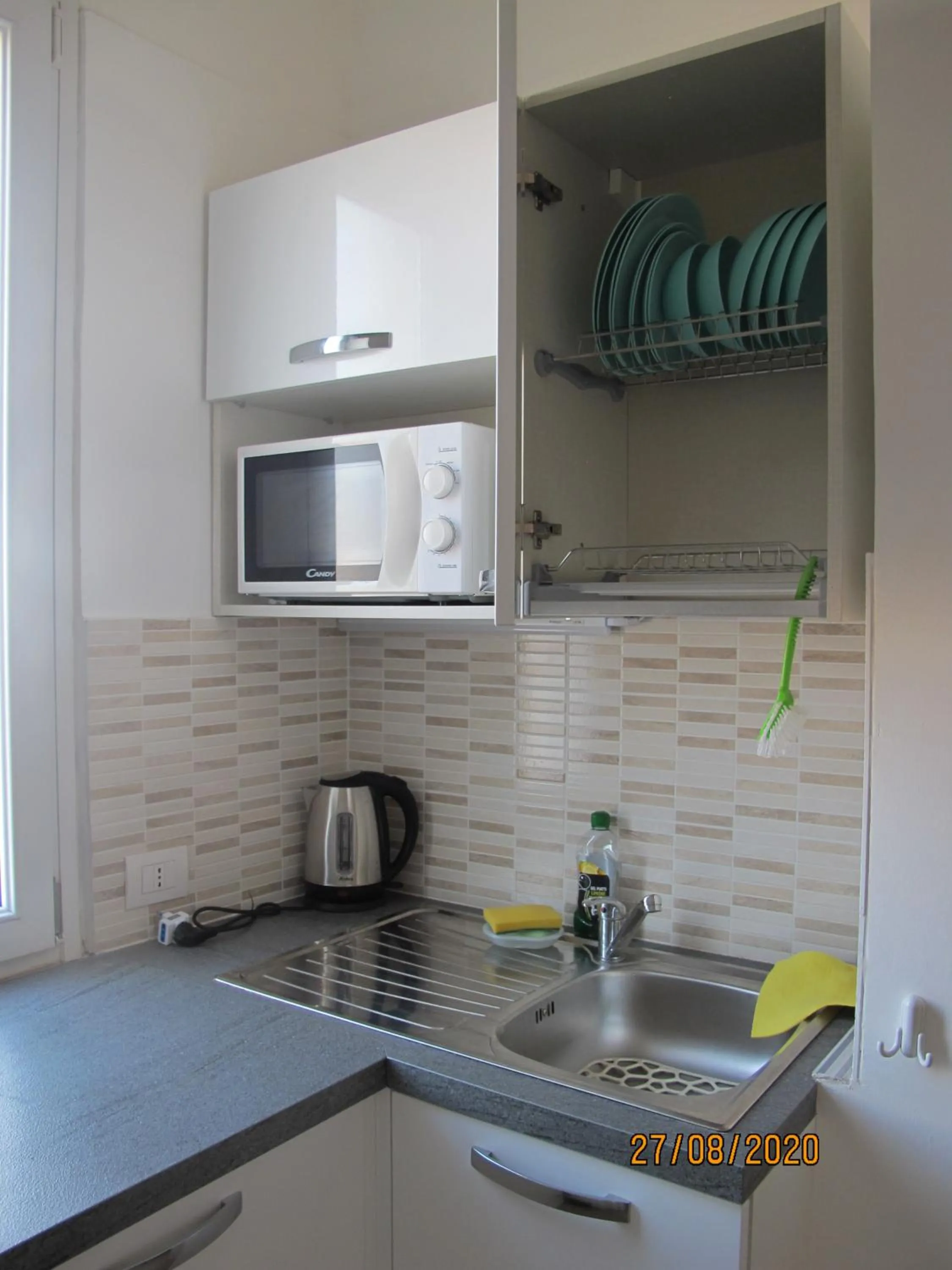 Kitchen or kitchenette in Santa Barbara hotel & apartments