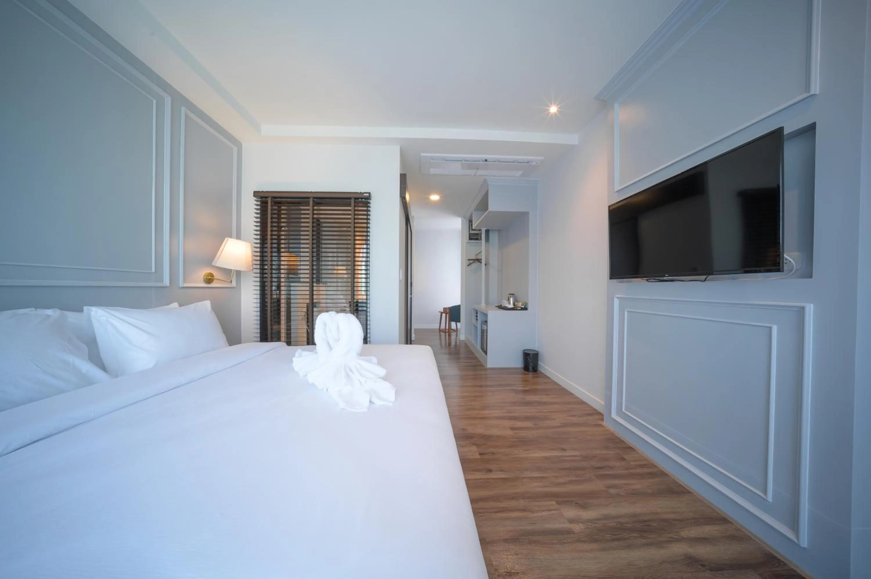 Photo of the whole room, Bed in The Wing Boutique Hotel