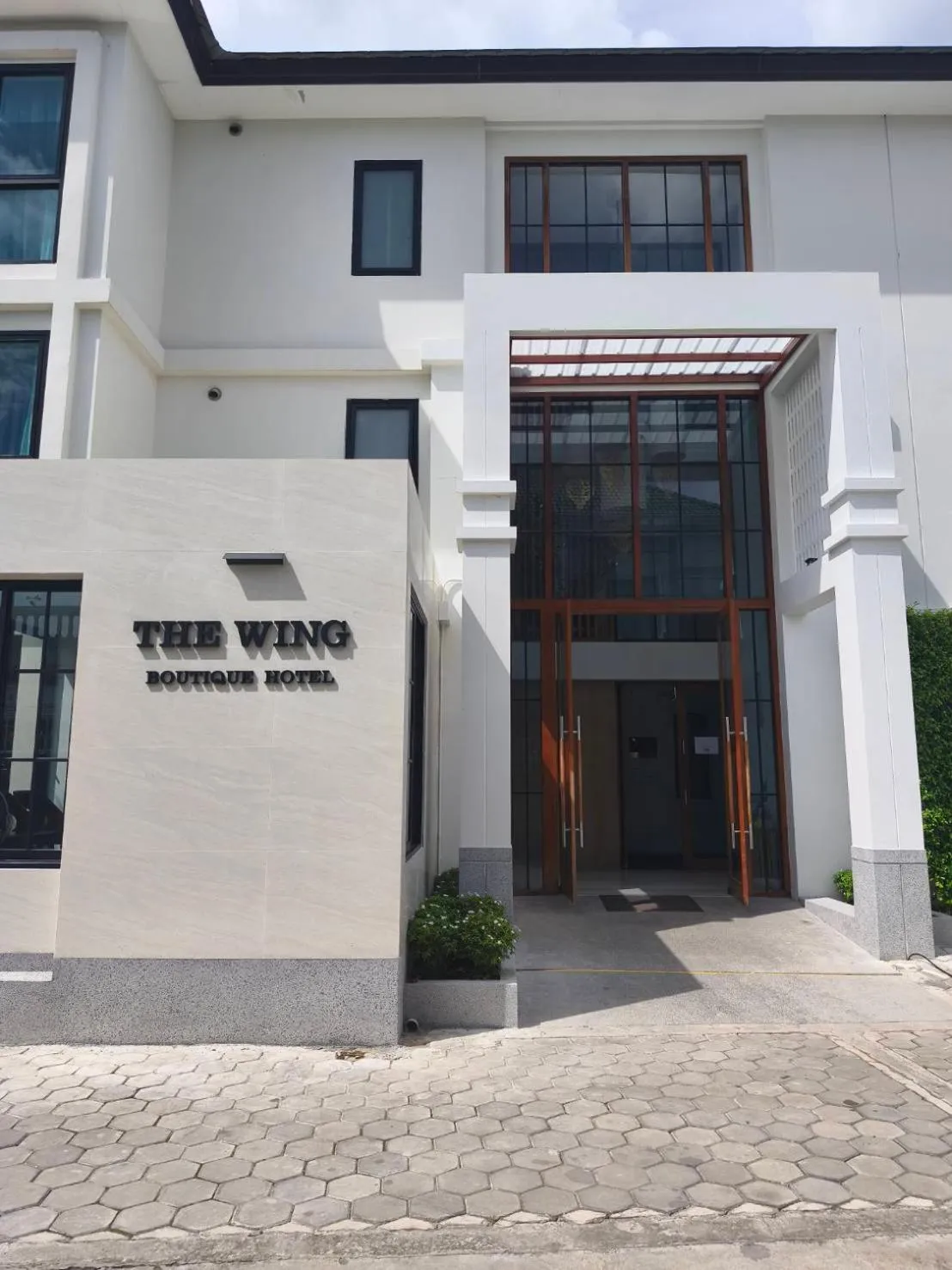 Property building in The Wing Boutique Hotel