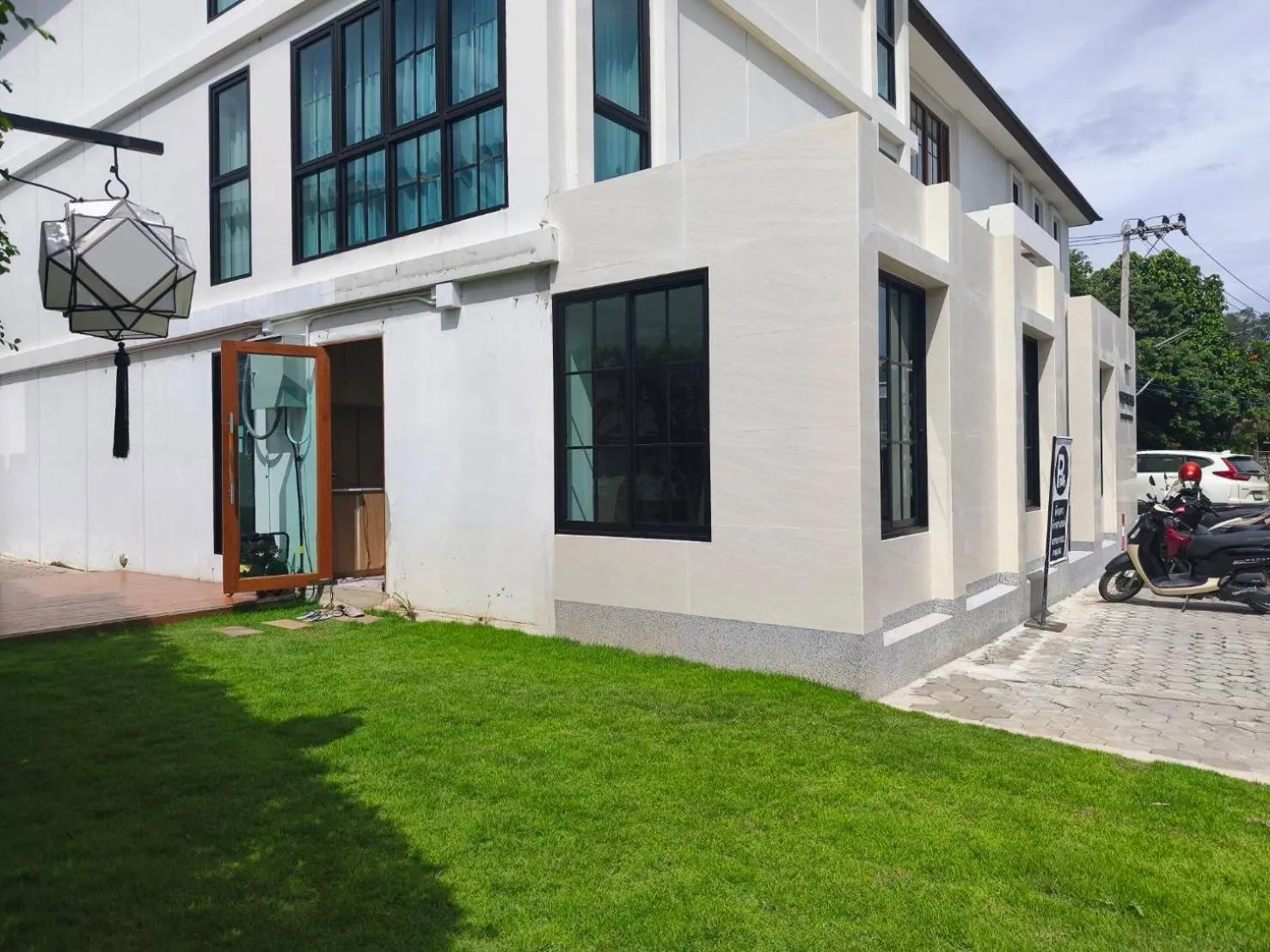 Property building in The Wing Boutique Hotel