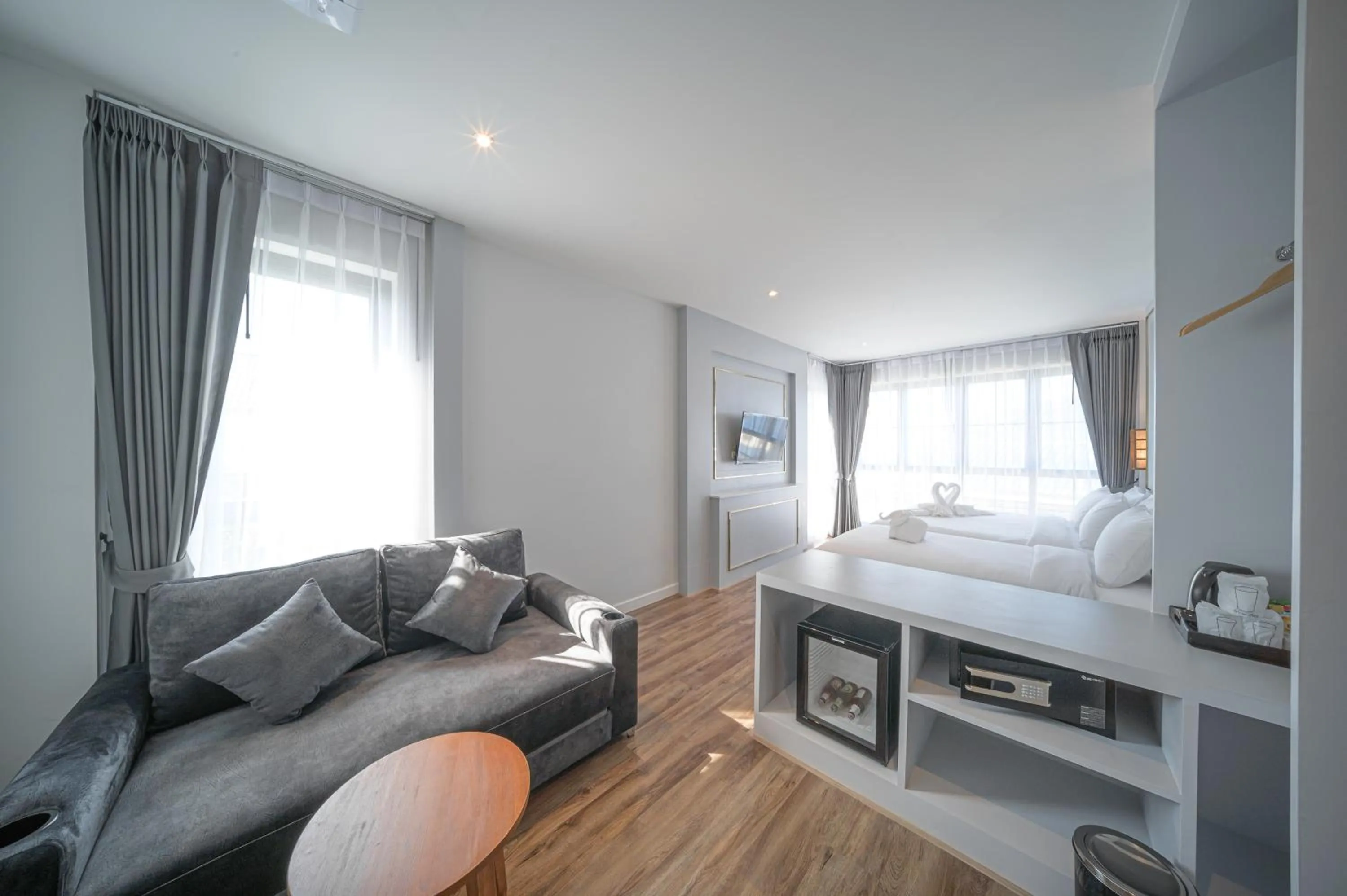 Photo of the whole room, Bed in The Wing Boutique Hotel