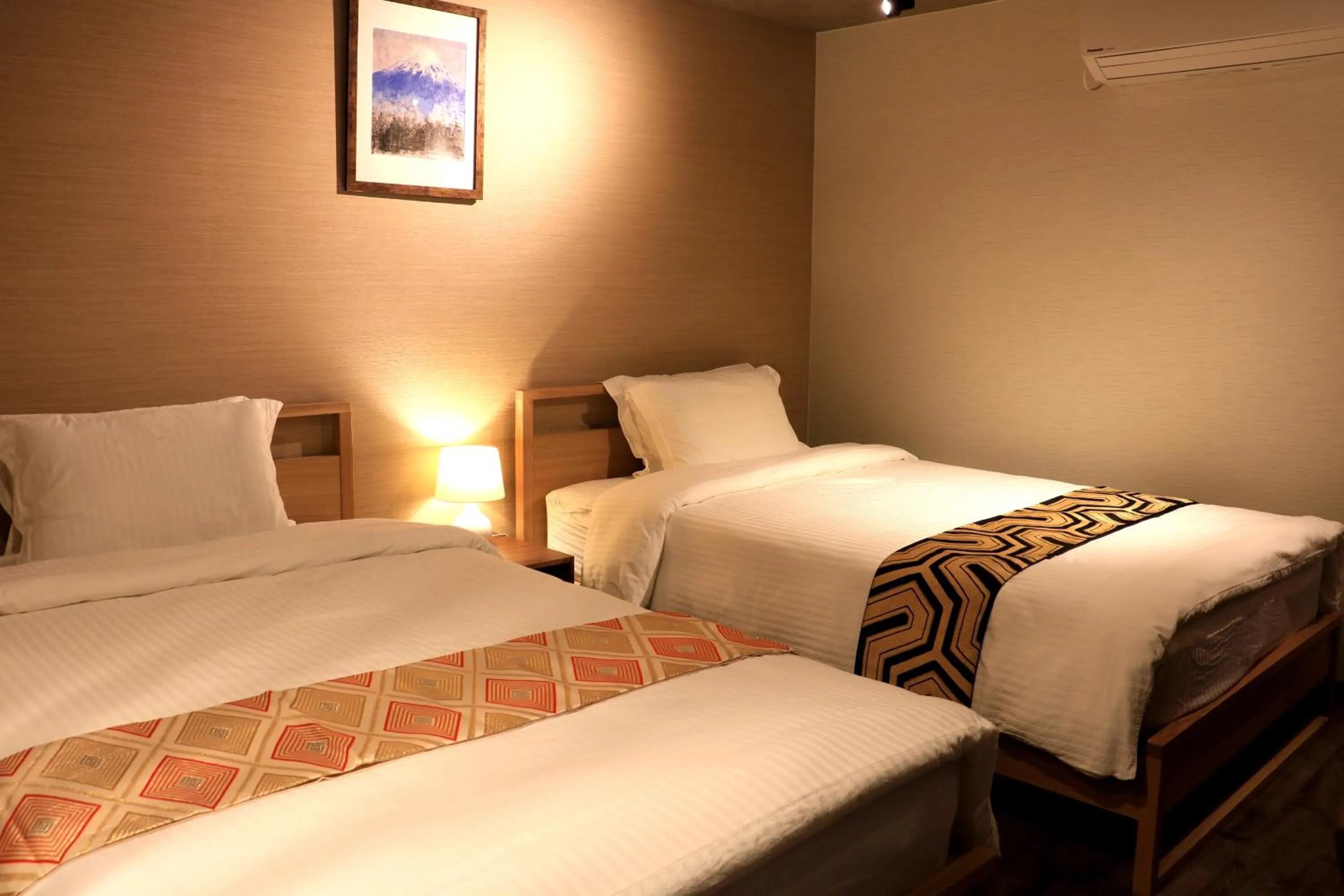 Bed in Hotel Traveling Bridge Nijojo