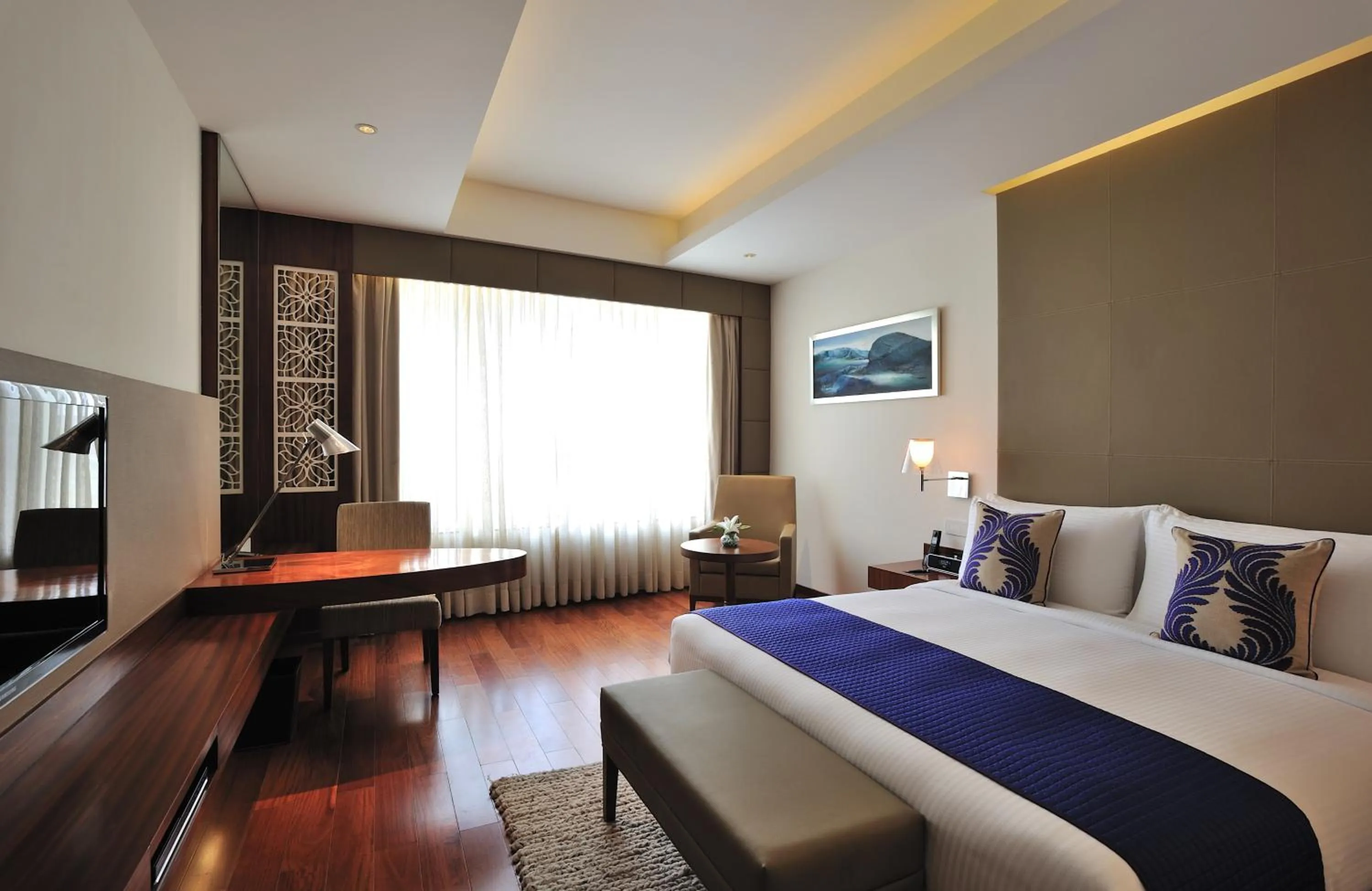 Photo of the whole room, Bed in The Anya Hotel-Golf Course Road