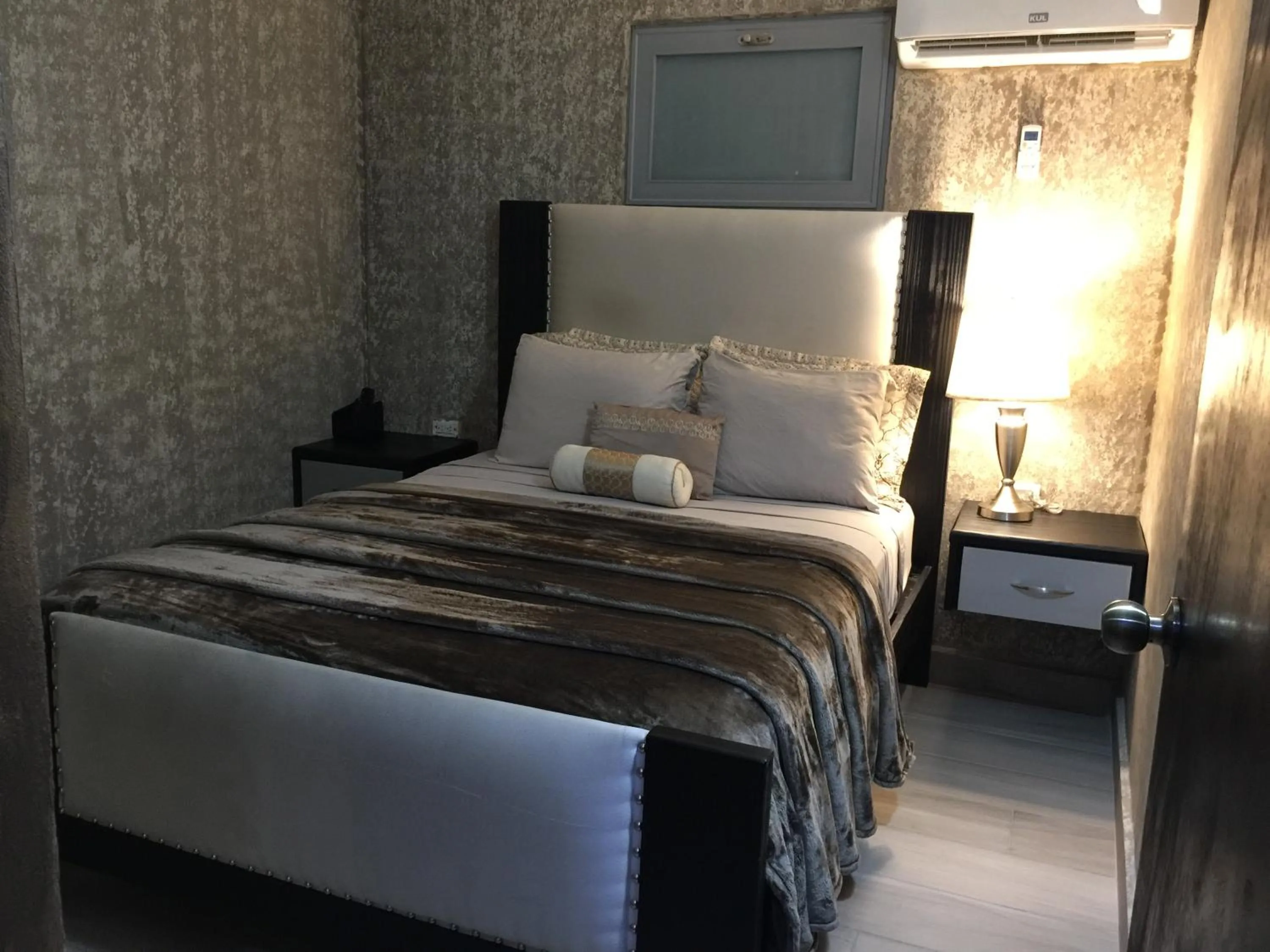 Bed in SEGOVIA STUDIO UNITS