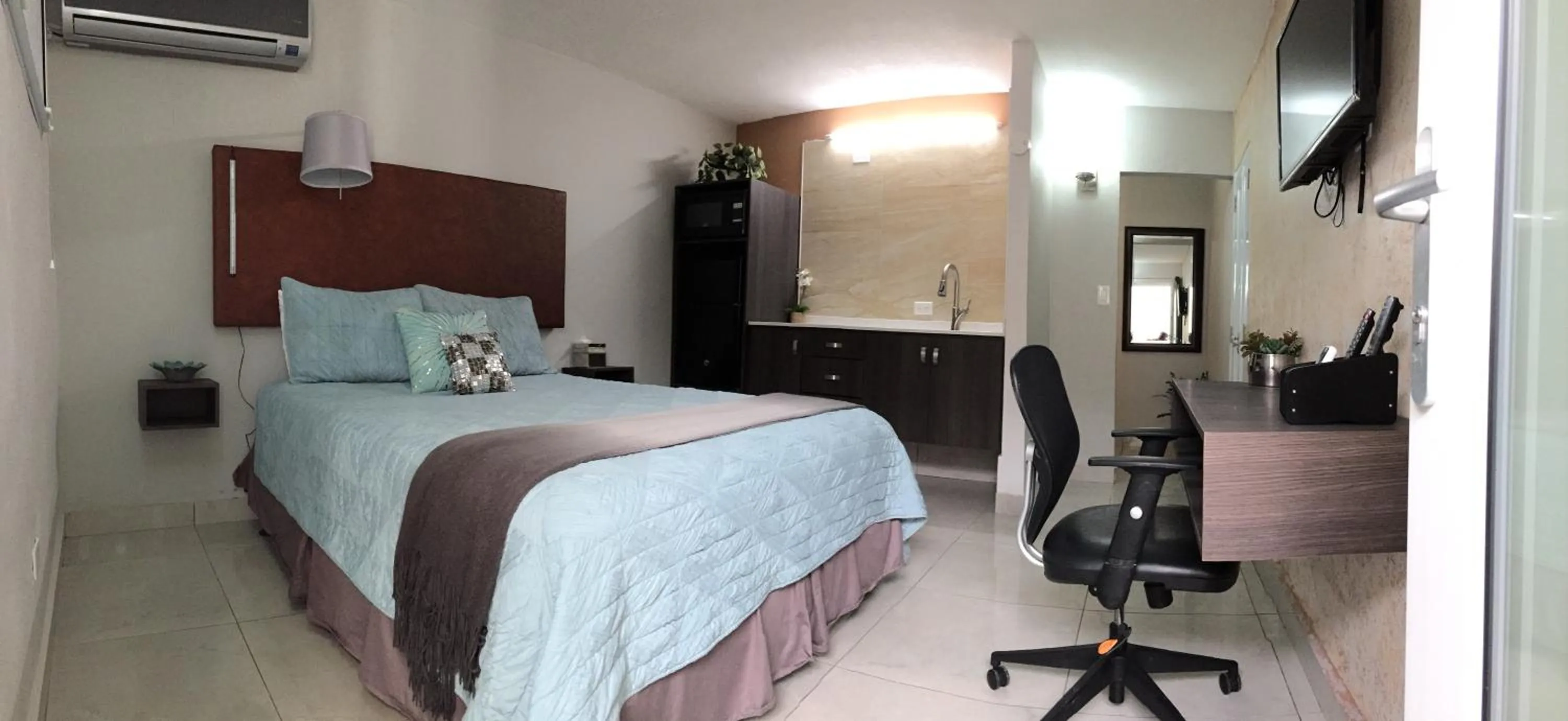 Bed in SEGOVIA STUDIO UNITS