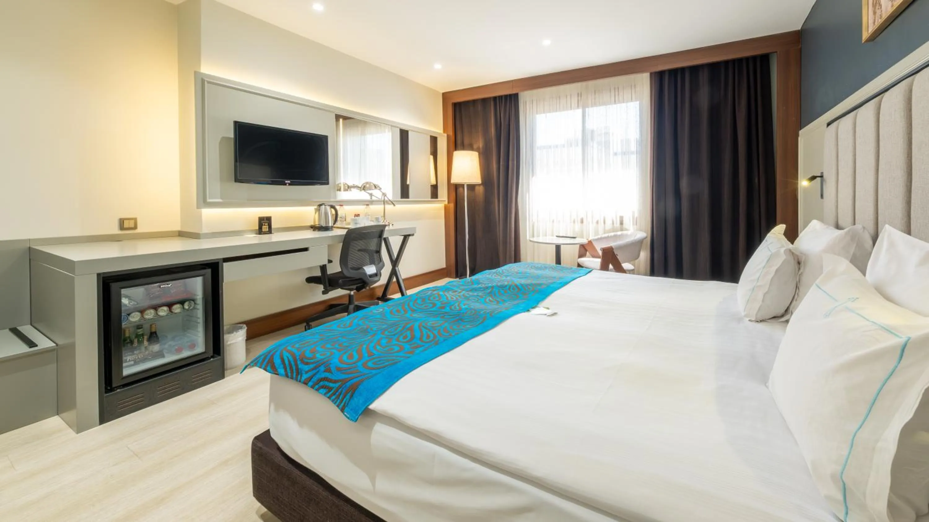 Bed in Teymur Continental Hotel